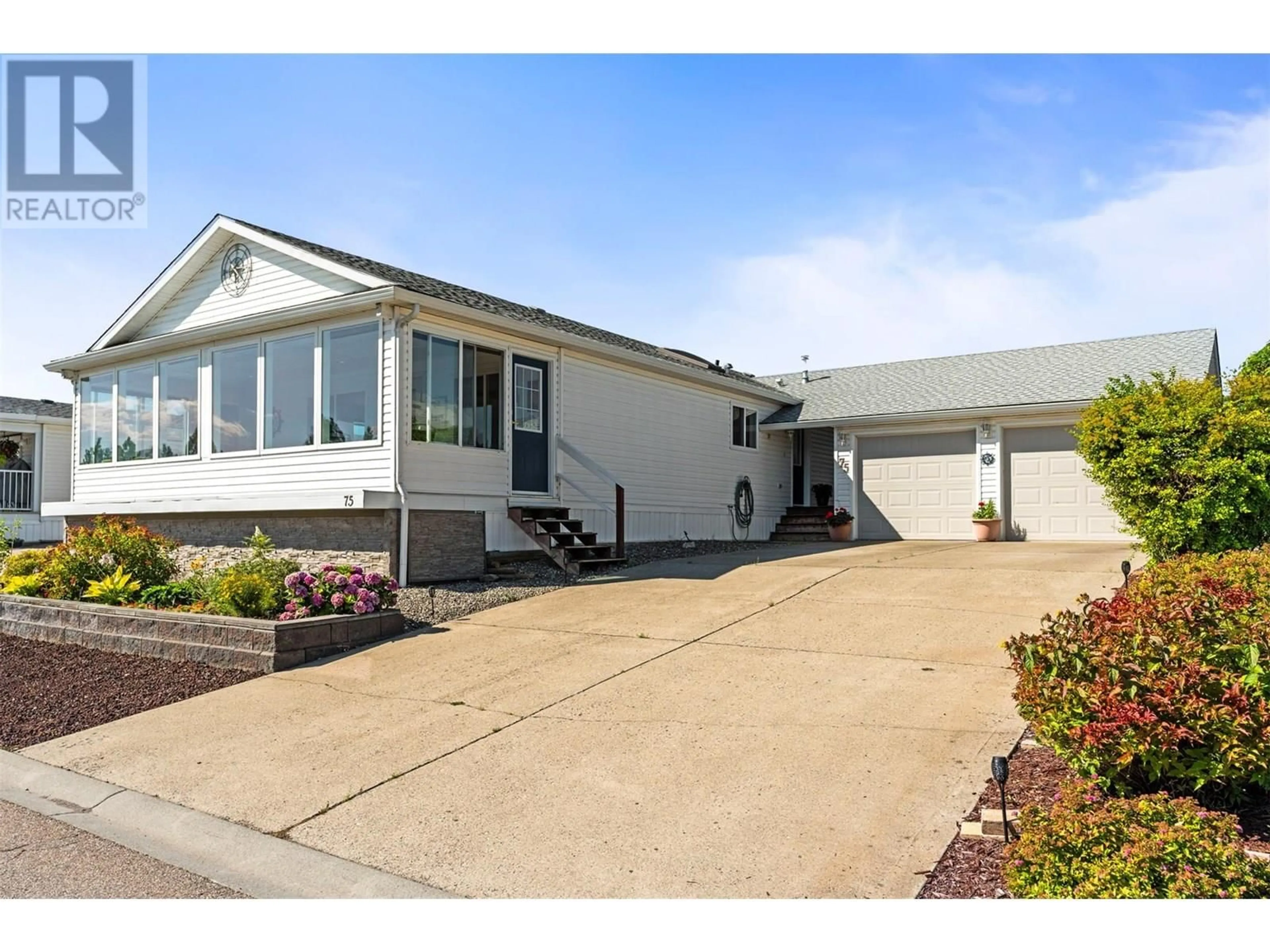 Home with vinyl exterior material, street for 75 - 9510 HIGHWAY 97 OTHER NORTH, Vernon British Columbia V1H1R8