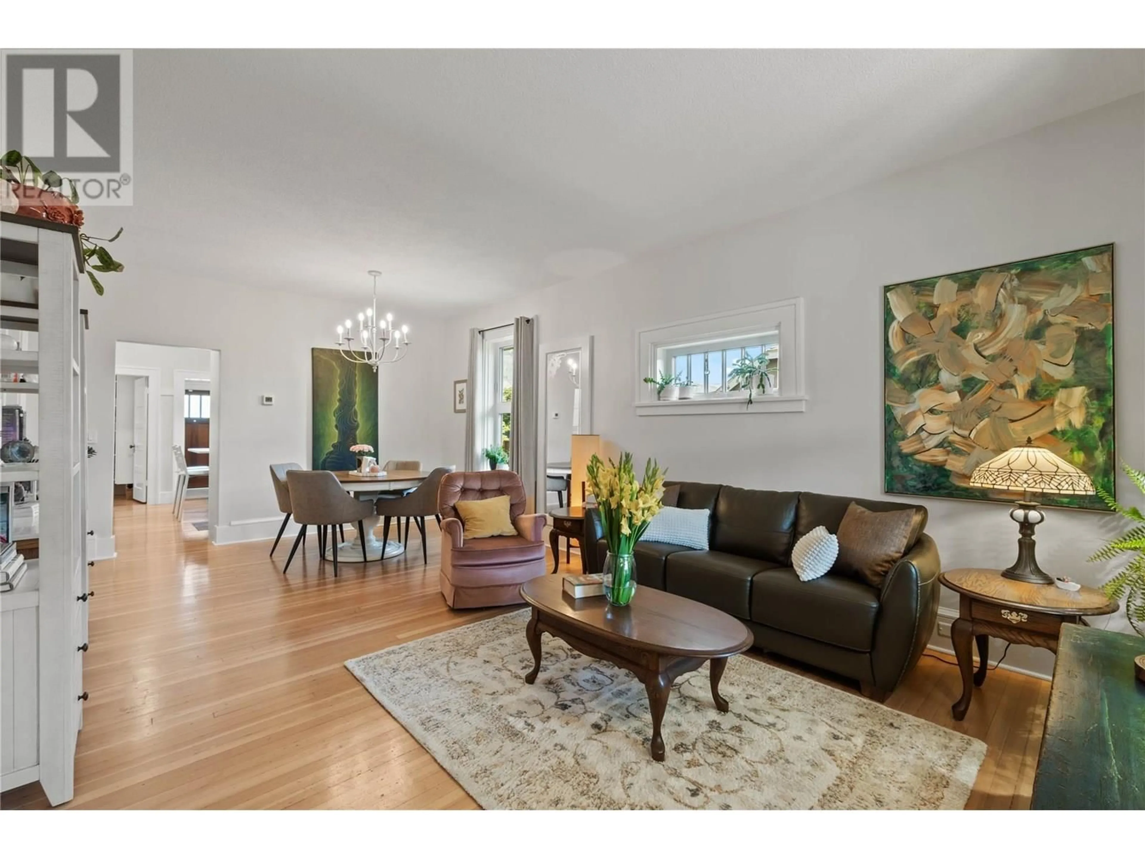 Living room with furniture, wood/laminate floor for 670 COLUMBIA STREET, Kamloops British Columbia V2C2V3