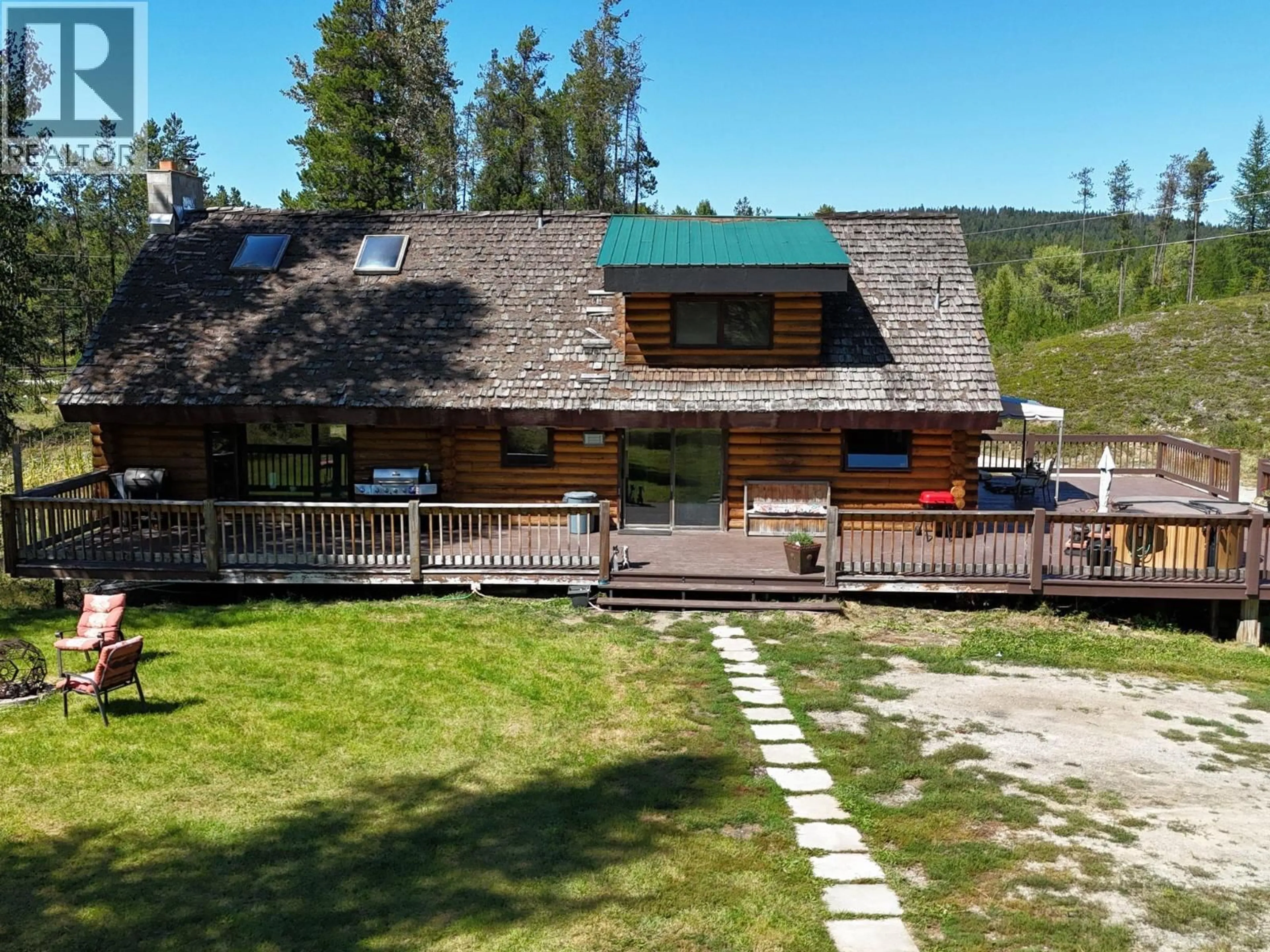 A pic from outside/outdoor area/front of a property/back of a property/a pic from drone, mountain view for 5698 HIDDEN VALLEY ROAD, Cranbrook British Columbia V1C6Z3