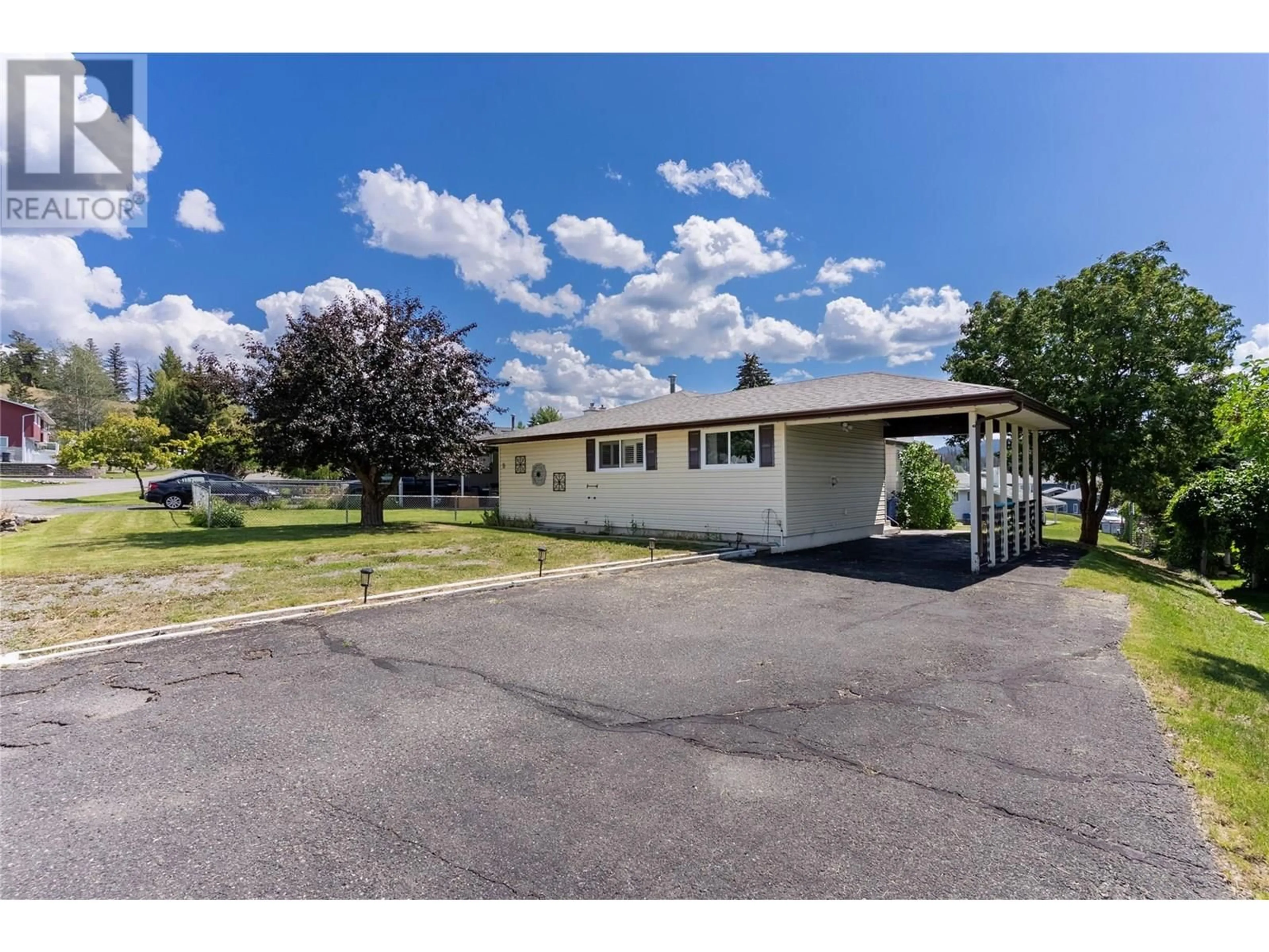 A pic from outside/outdoor area/front of a property/back of a property/a pic from drone, street for 9 EMERALD DRIVE, Logan Lake British Columbia V0K1W0