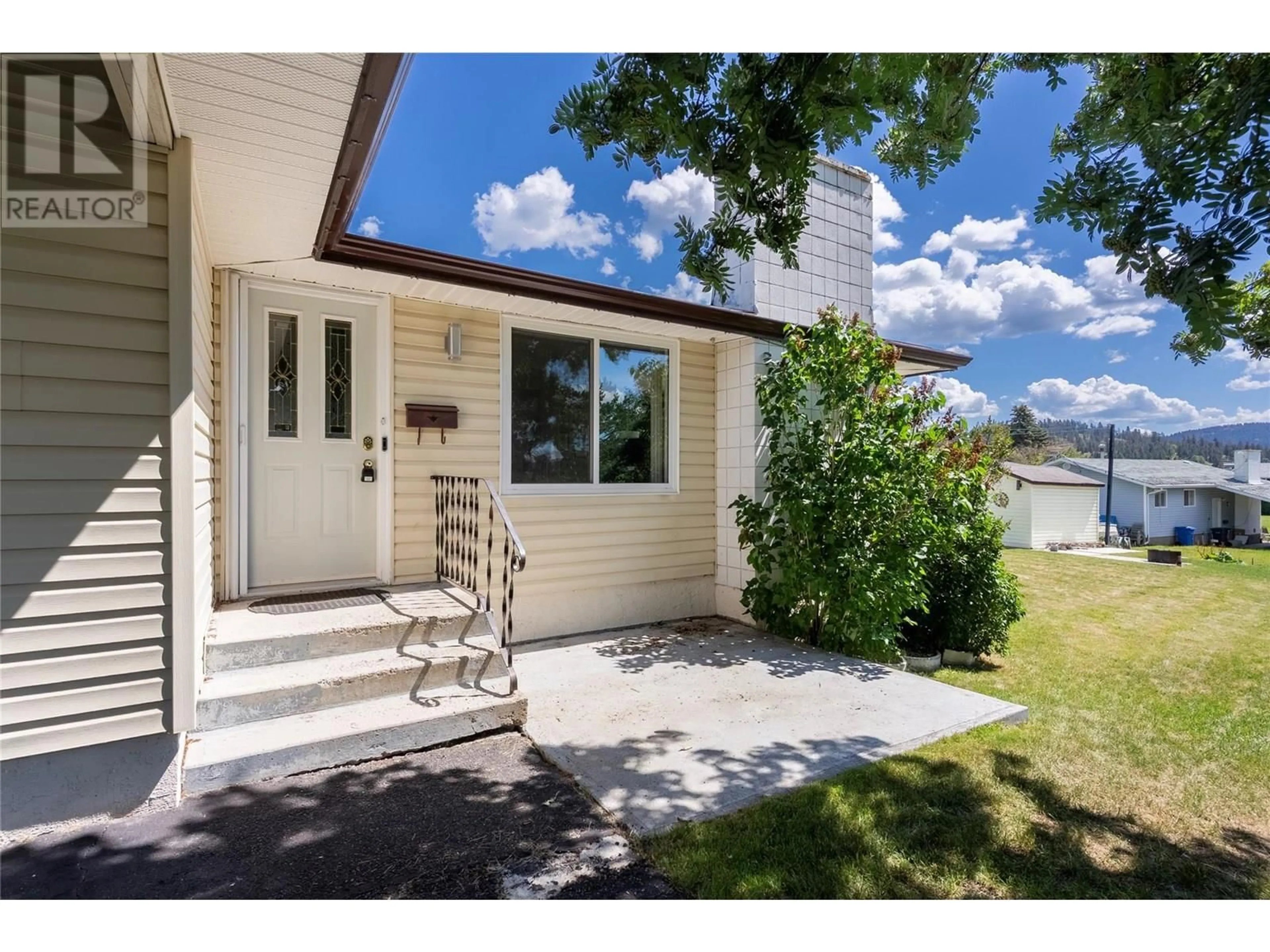 Home with vinyl exterior material, street for 9 EMERALD DRIVE, Logan Lake British Columbia V0K1W0