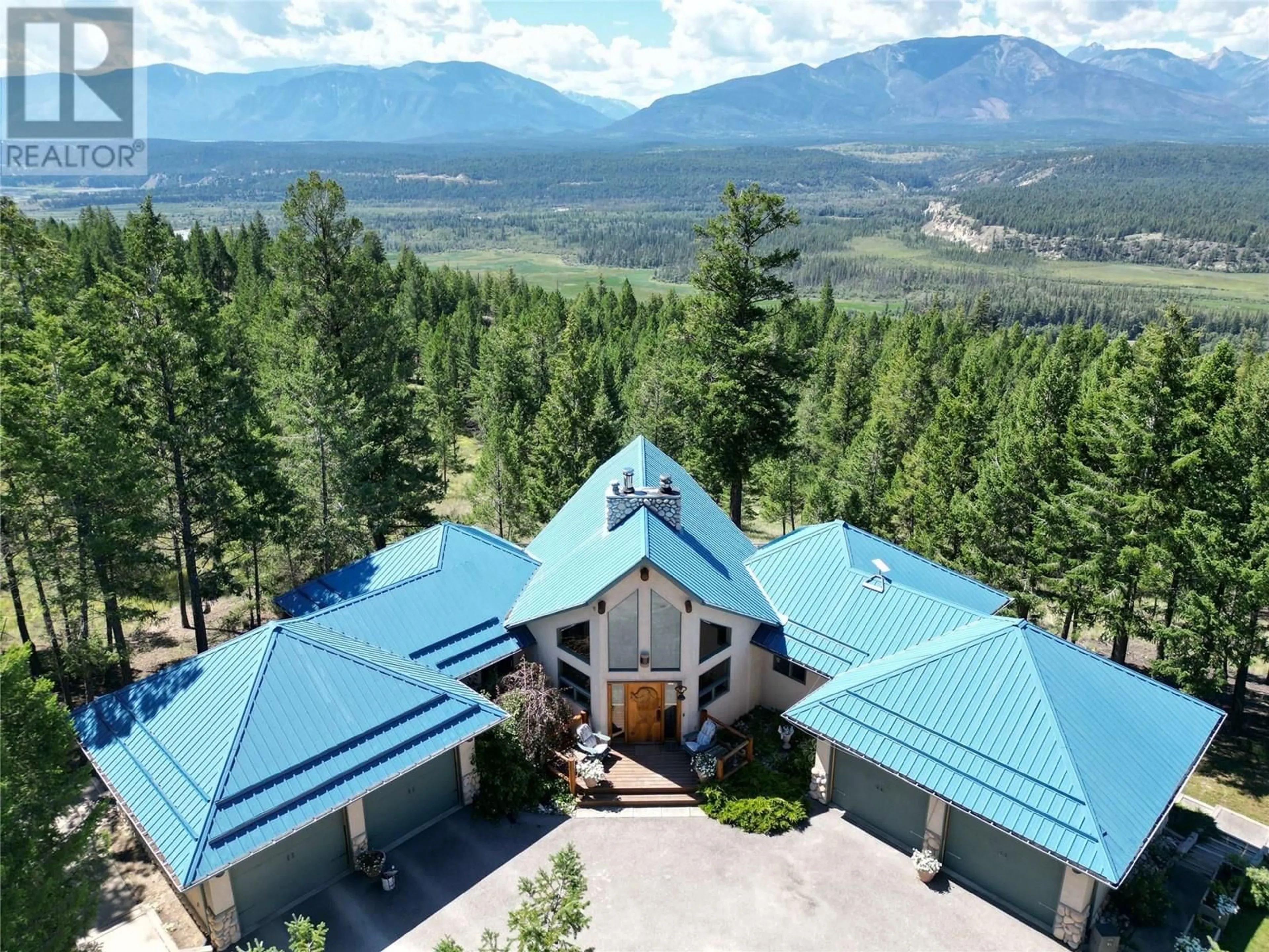 A pic from outside/outdoor area/front of a property/back of a property/a pic from drone, mountain view for 8161 93/95 HIGHWAY, Radium Hot Springs British Columbia V0A1M0