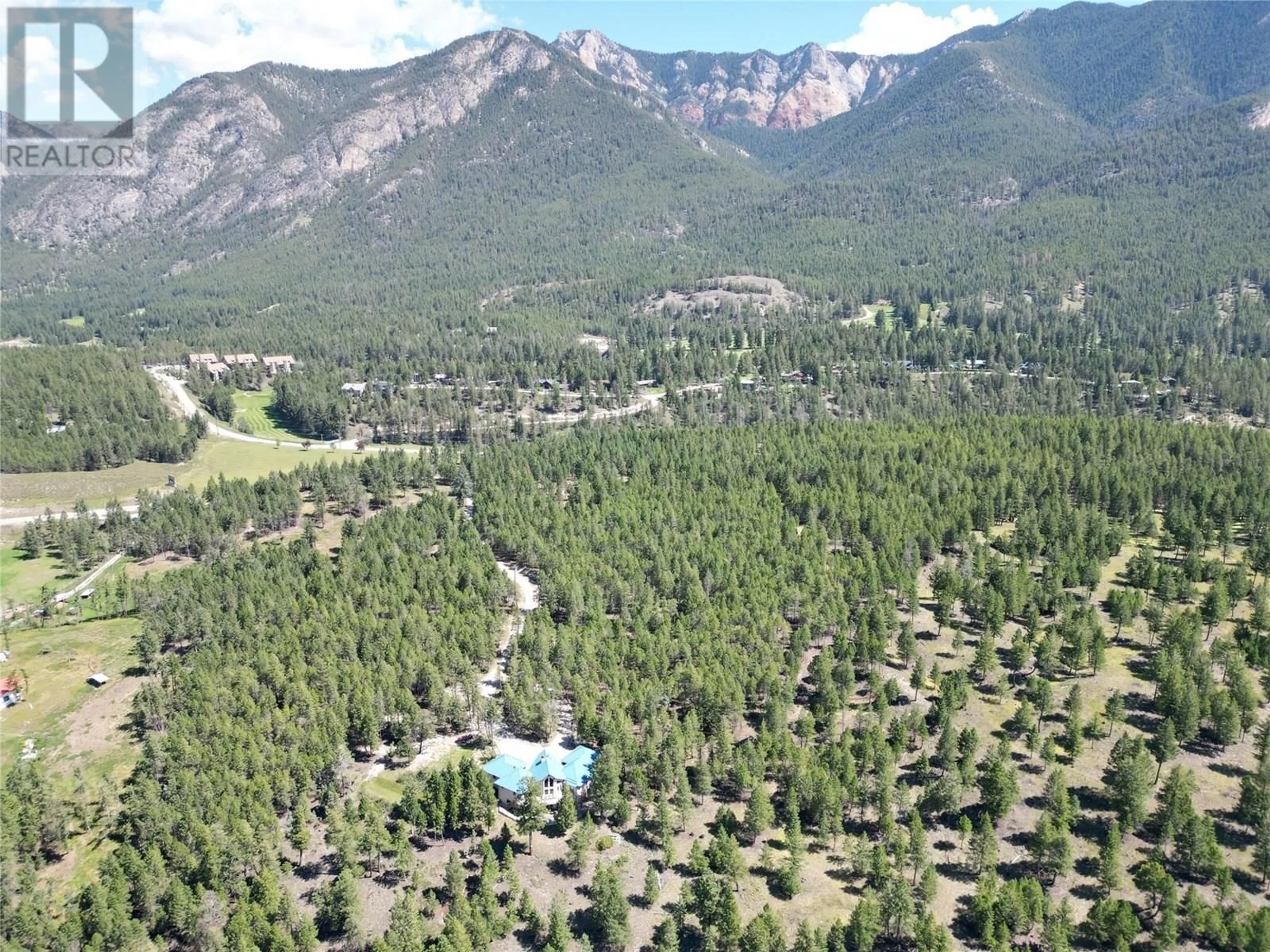 A pic from outside/outdoor area/front of a property/back of a property/a pic from drone, mountain view for 8161 93/95 HIGHWAY, Radium Hot Springs British Columbia V0A1M0