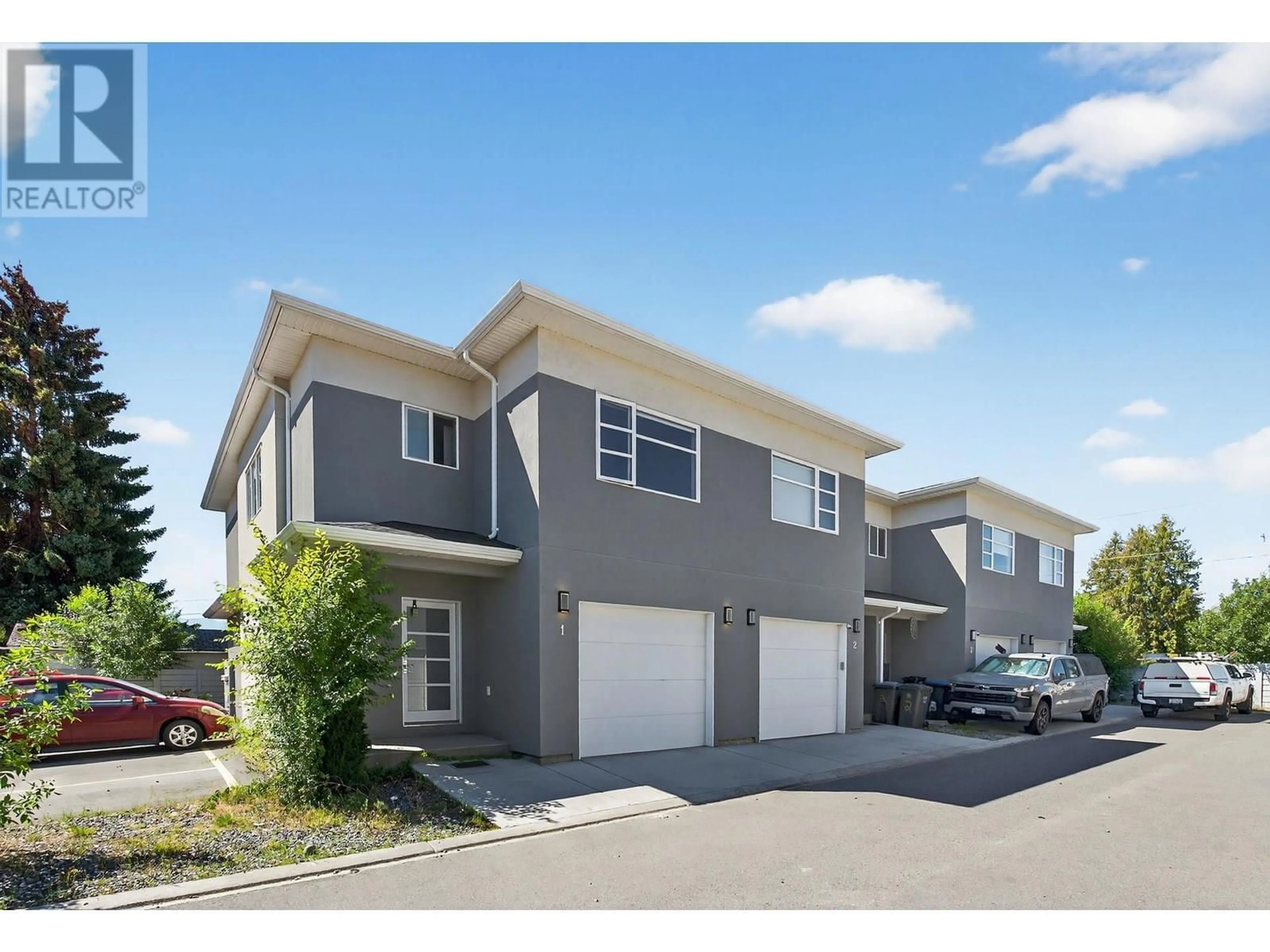 A pic from outside/outdoor area/front of a property/back of a property/a pic from drone, street for 1 - 415 RUTLAND ROAD, Kelowna British Columbia V1X3B3