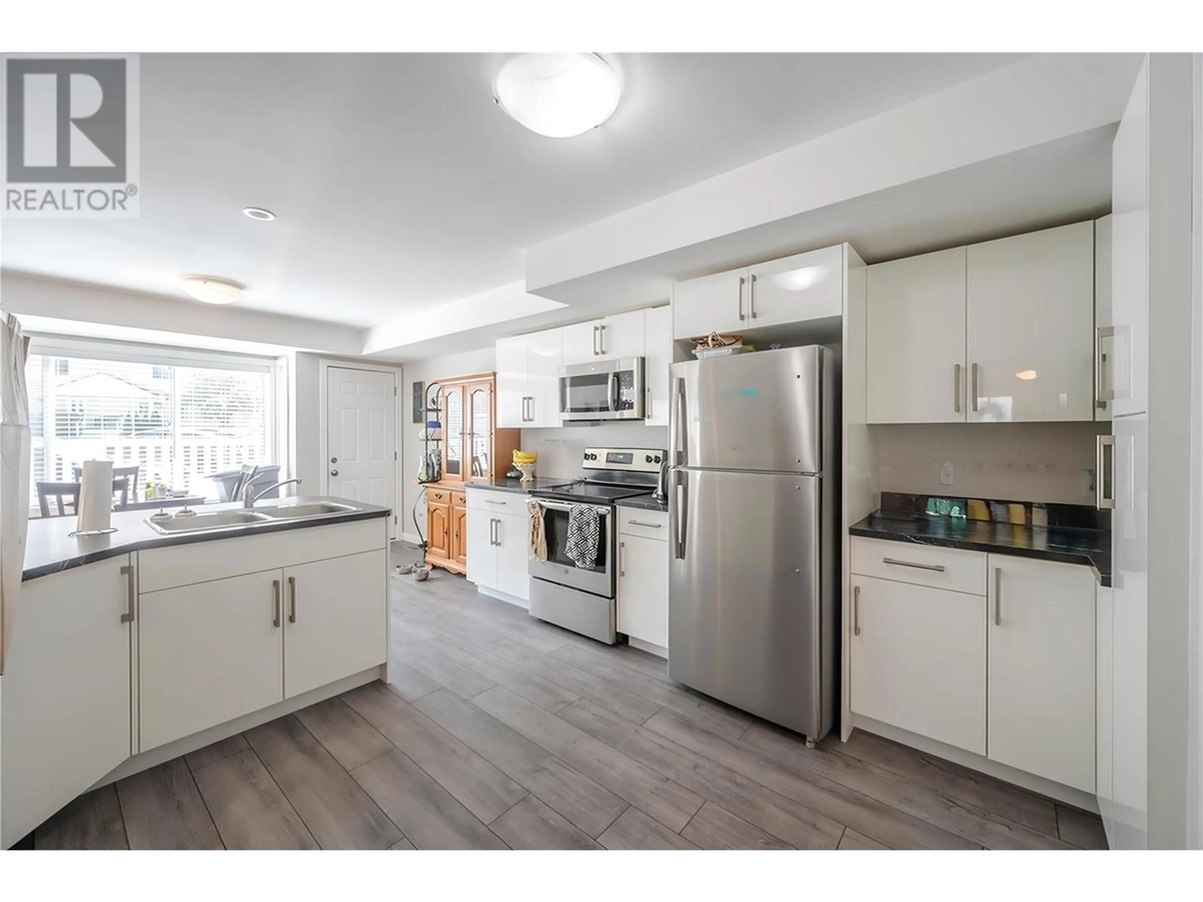 Open concept kitchen, unknown for 123 - 1458 PENTICTON AVENUE, Penticton British Columbia V2A8L3