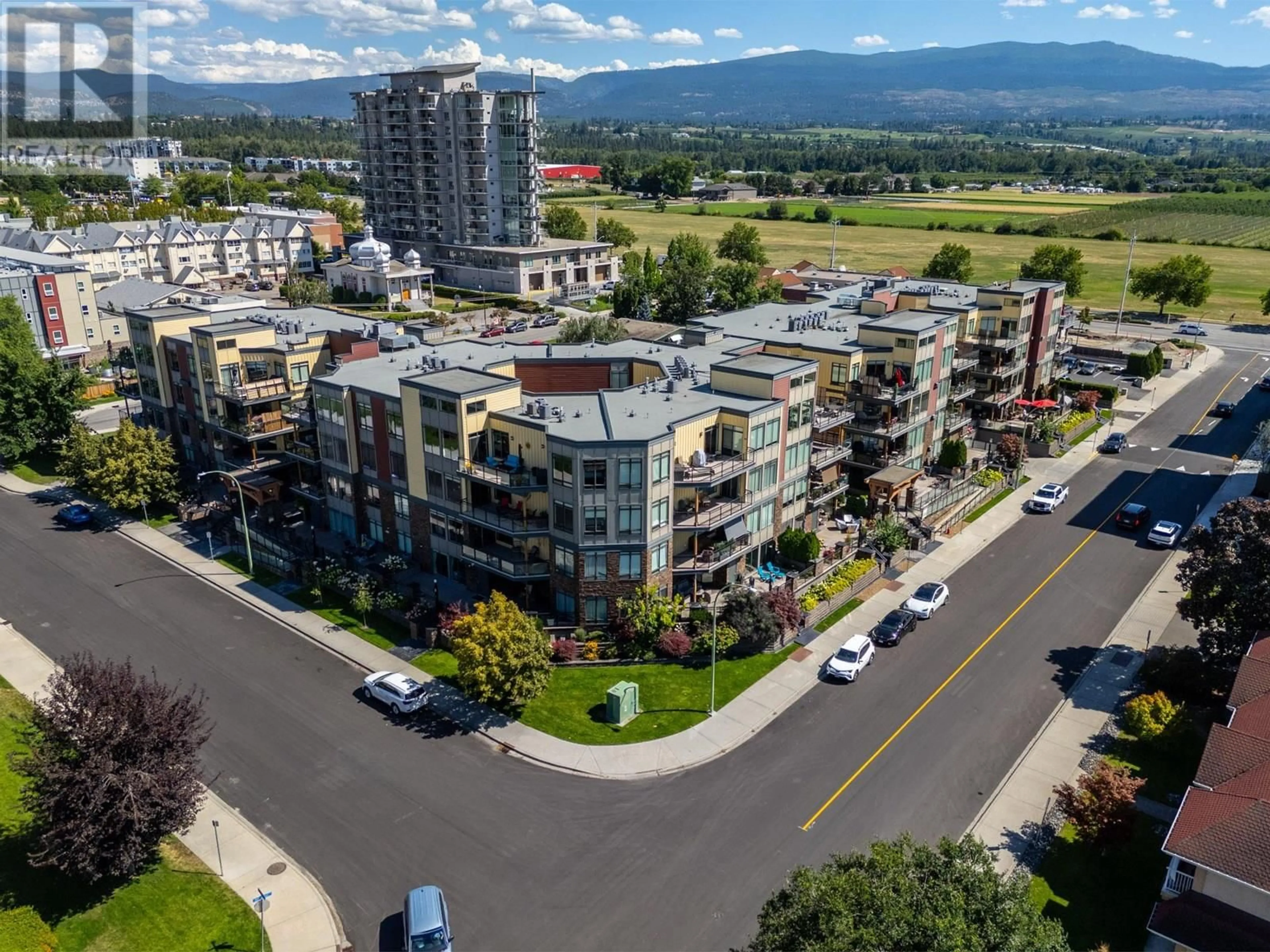 A pic from outside/outdoor area/front of a property/back of a property/a pic from drone, mountain view for 301 - 1933 AMBROSI ROAD, Kelowna British Columbia V1Y4S1