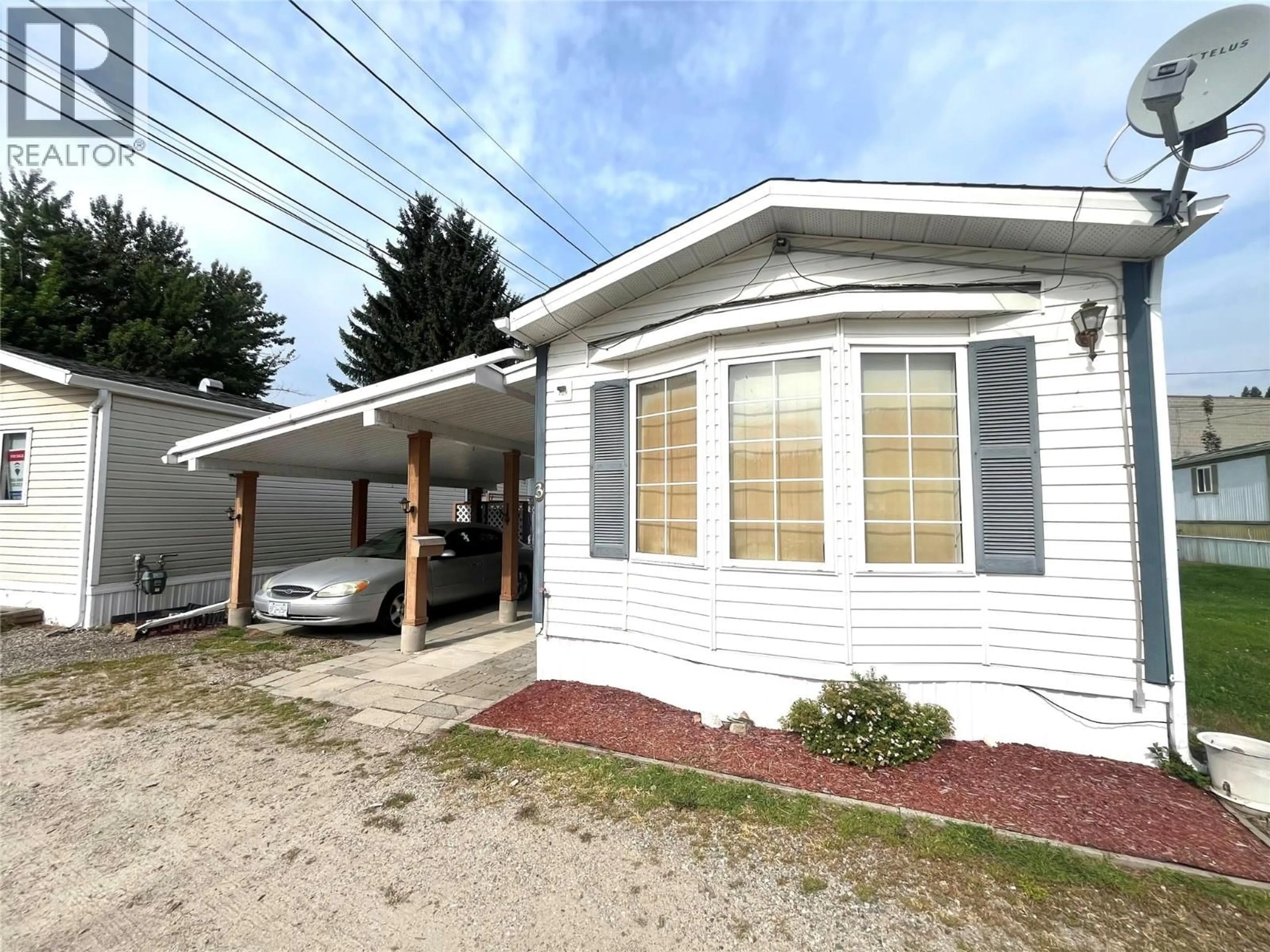Home with vinyl exterior material, street for 3 - 3080 HIGHWAY DRIVE, Trail British Columbia V1R2T3