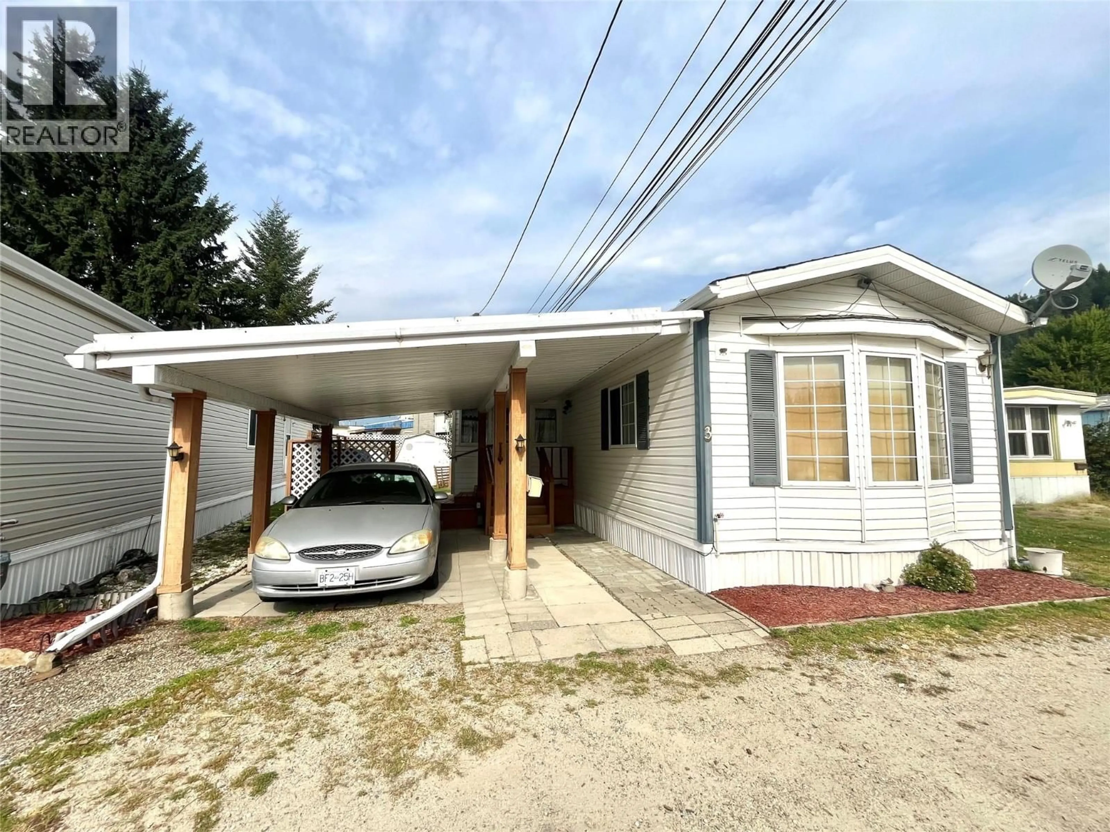 Home with vinyl exterior material, street for 3 - 3080 HIGHWAY DRIVE, Trail British Columbia V1R2T3
