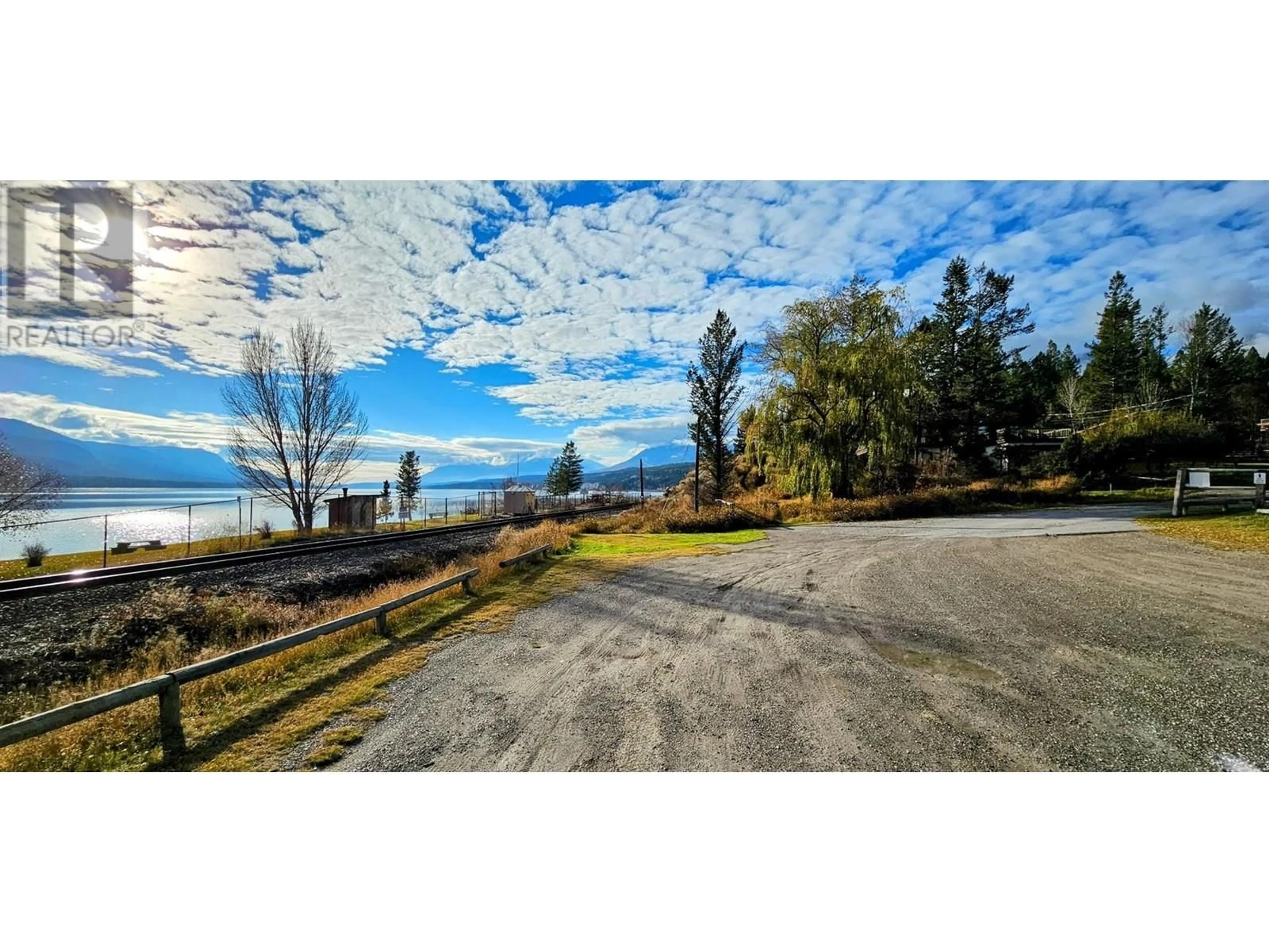 A pic from outside/outdoor area/front of a property/back of a property/a pic from drone, water/lake/river/ocean view for 4553 COLUMERE ROAD, Fairmont Hot Springs British Columbia V0B1L2