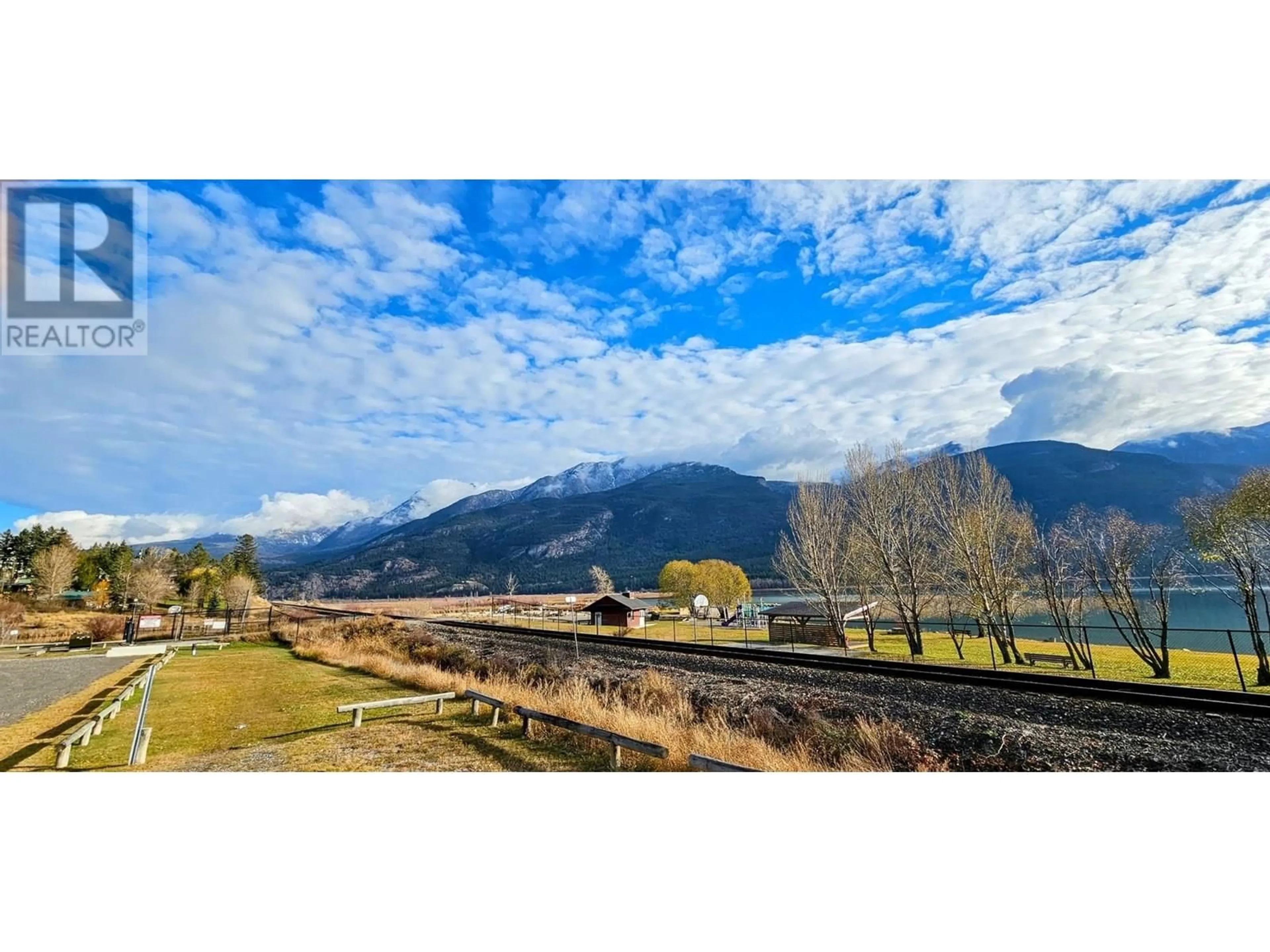 A pic from outside/outdoor area/front of a property/back of a property/a pic from drone, mountain view for 4553 COLUMERE ROAD, Fairmont Hot Springs British Columbia V0B1L2