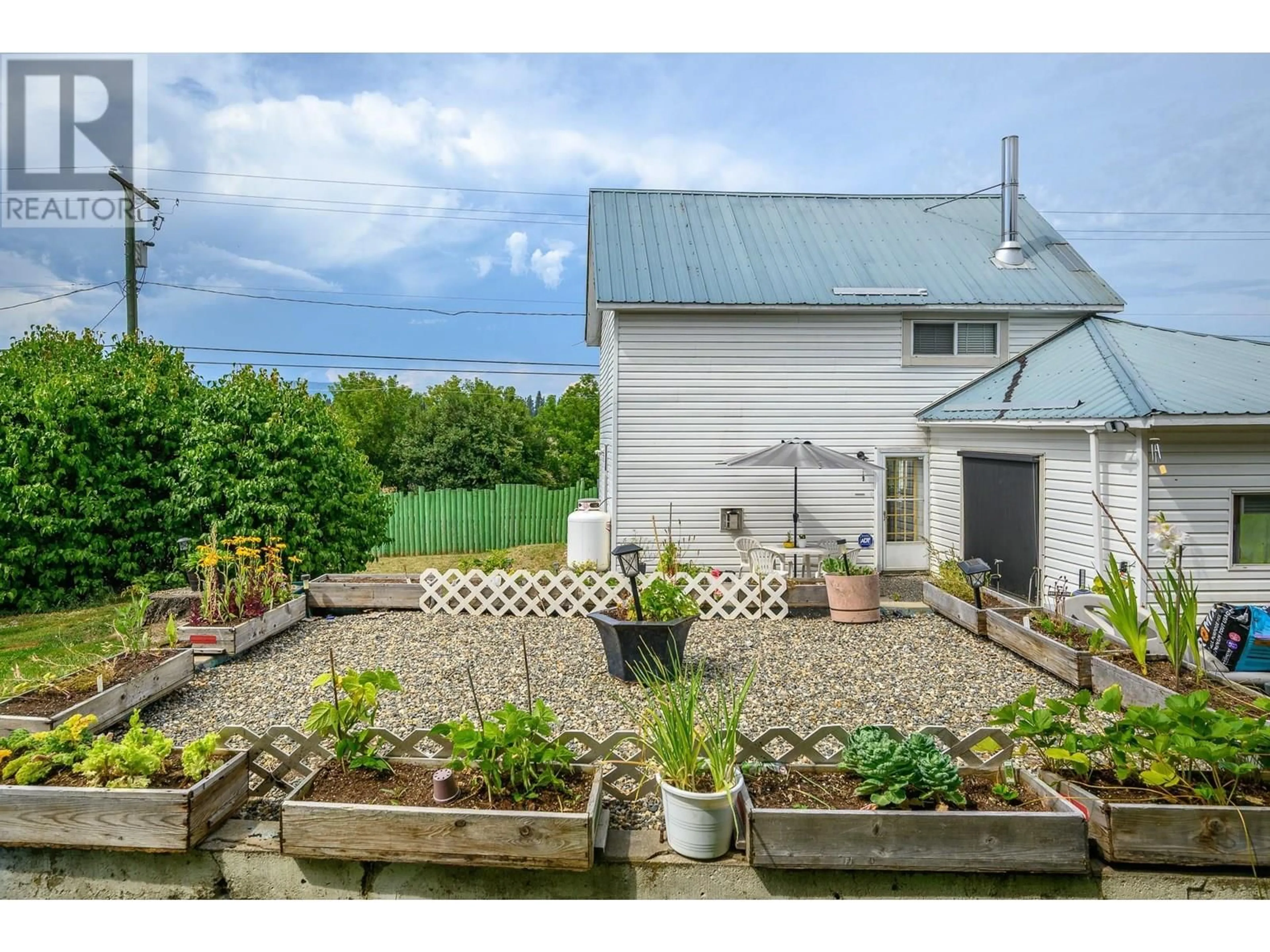 A pic from outside/outdoor area/front of a property/back of a property/a pic from drone, unknown for 4200 HIGHWAY 97A OTHER, Spallumcheen British Columbia V4Y0S4