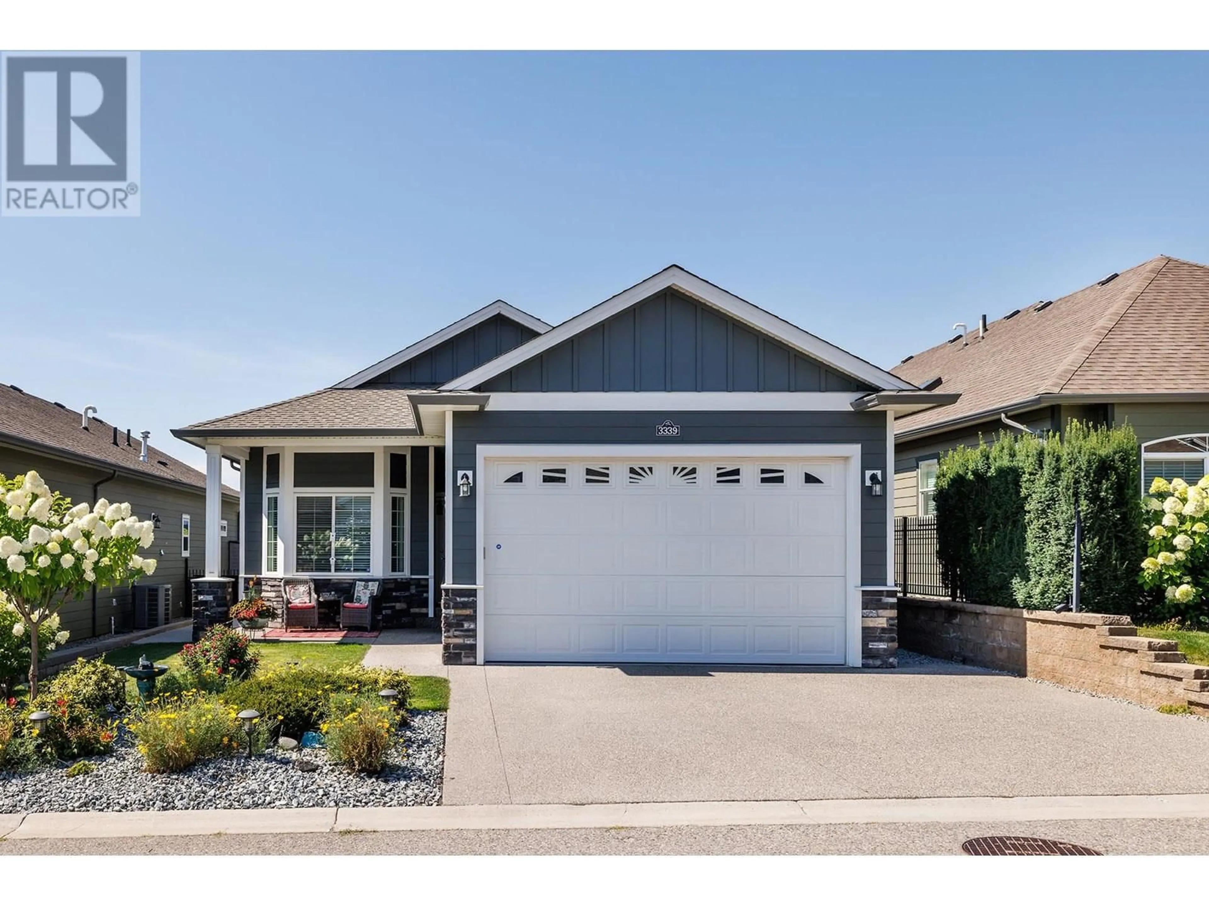 Home with vinyl exterior material, street for 3339 MIMOSA DRIVE, Westbank British Columbia V4T3A5