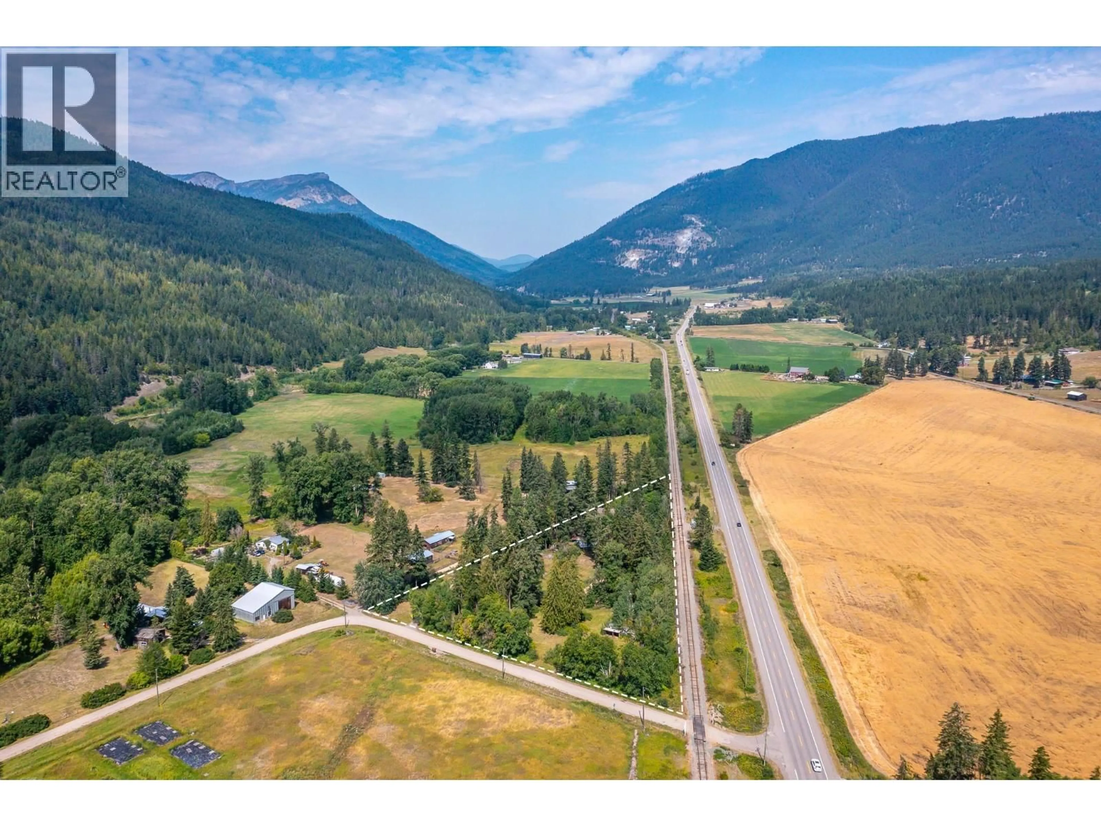 A pic from outside/outdoor area/front of a property/back of a property/a pic from drone, mountain view for 3508 SHAW ROAD, Falkland British Columbia V0E1W1