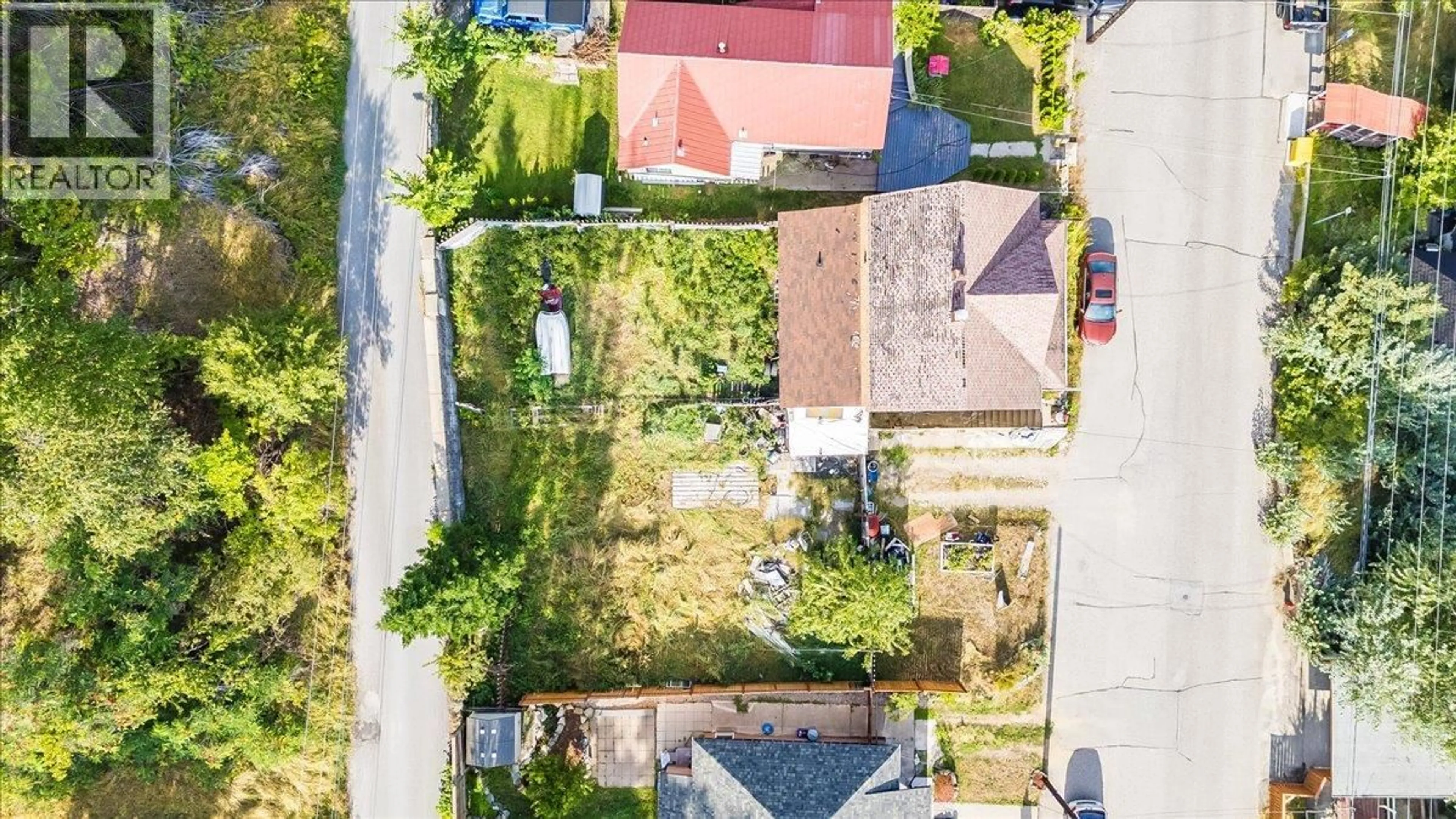 A pic from outside/outdoor area/front of a property/back of a property/a pic from drone, street for 1990 DANIEL STREET, Trail British Columbia V1R4G9