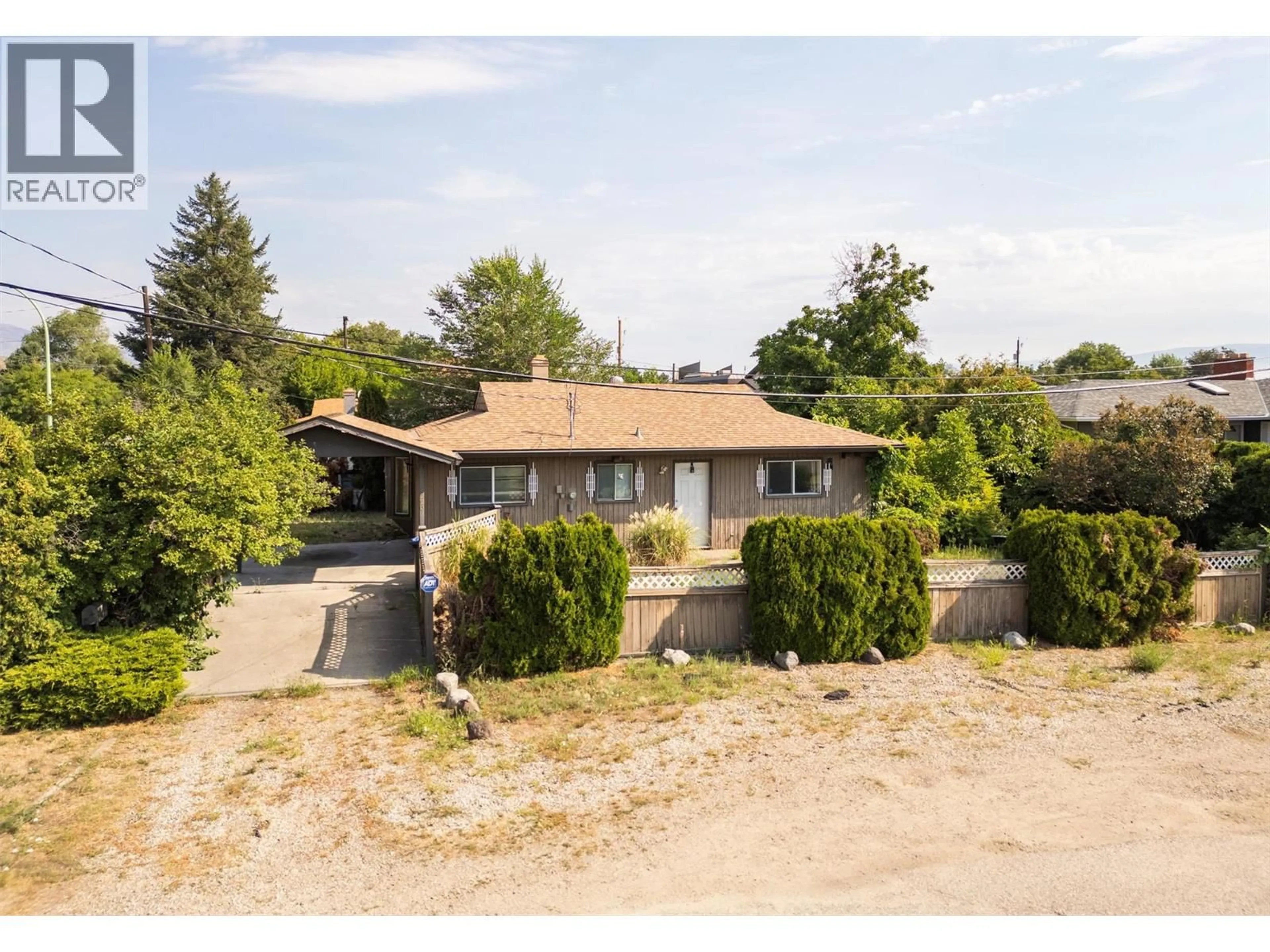 A pic from outside/outdoor area/front of a property/back of a property/a pic from drone, building for 1220 LADNER ROAD, Kelowna British Columbia V1W3M8