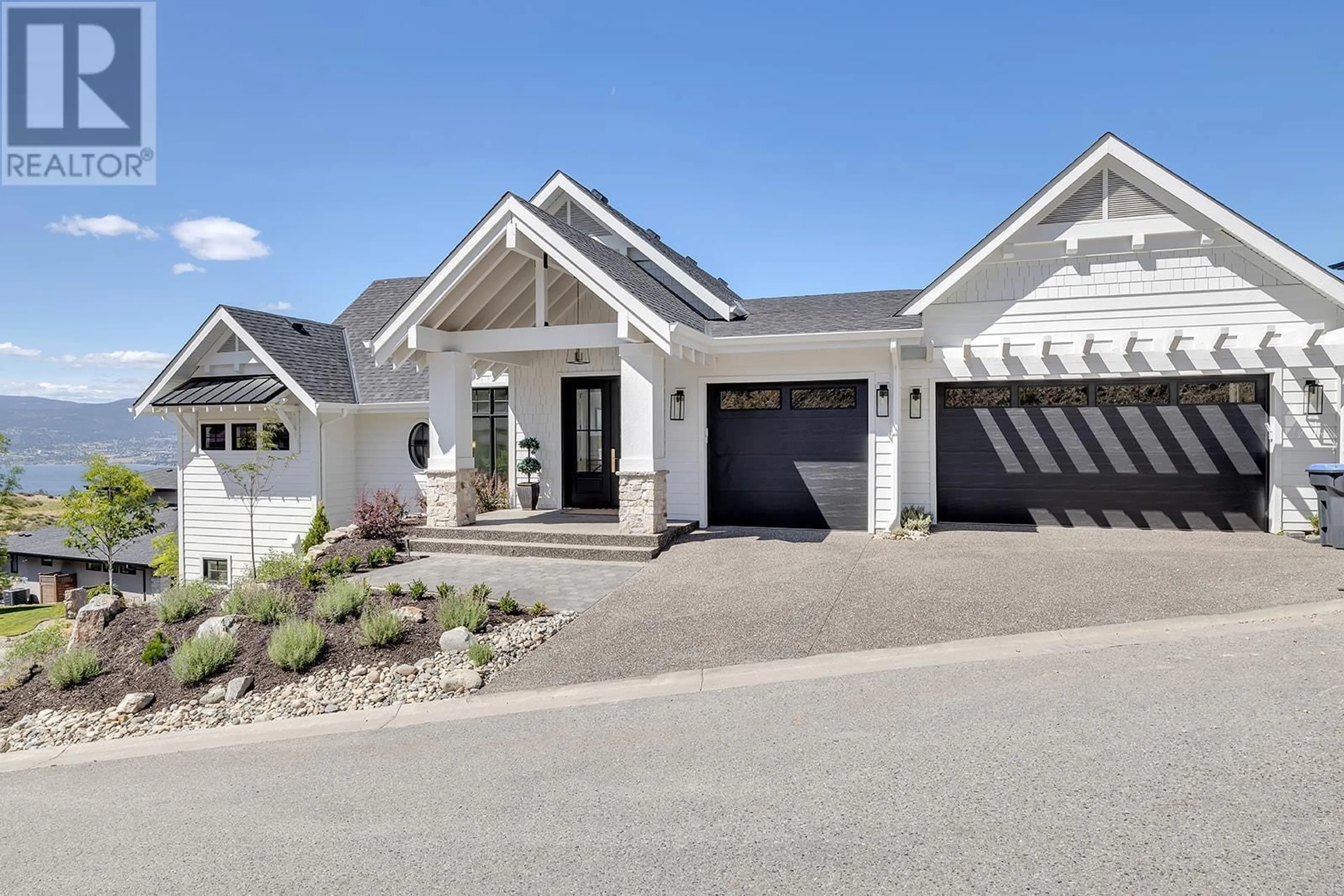 Home with vinyl exterior material, street for 5670 MOUNTAINSIDE COURT, Kelowna British Columbia V1W5L5
