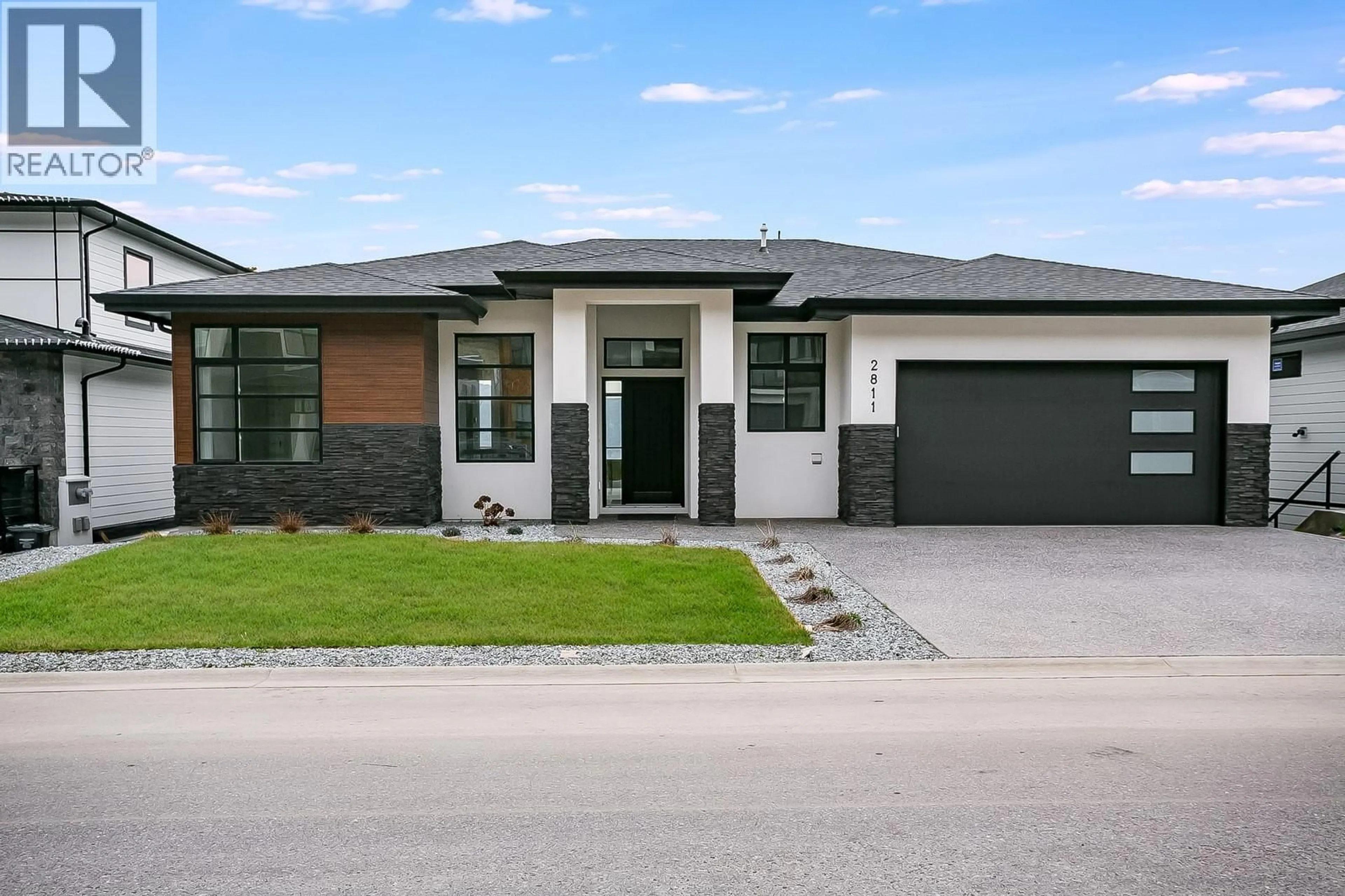 Home with brick exterior material, street for 2811 COPPER RIDGE DRIVE, West Kelowna British Columbia V4T0E7