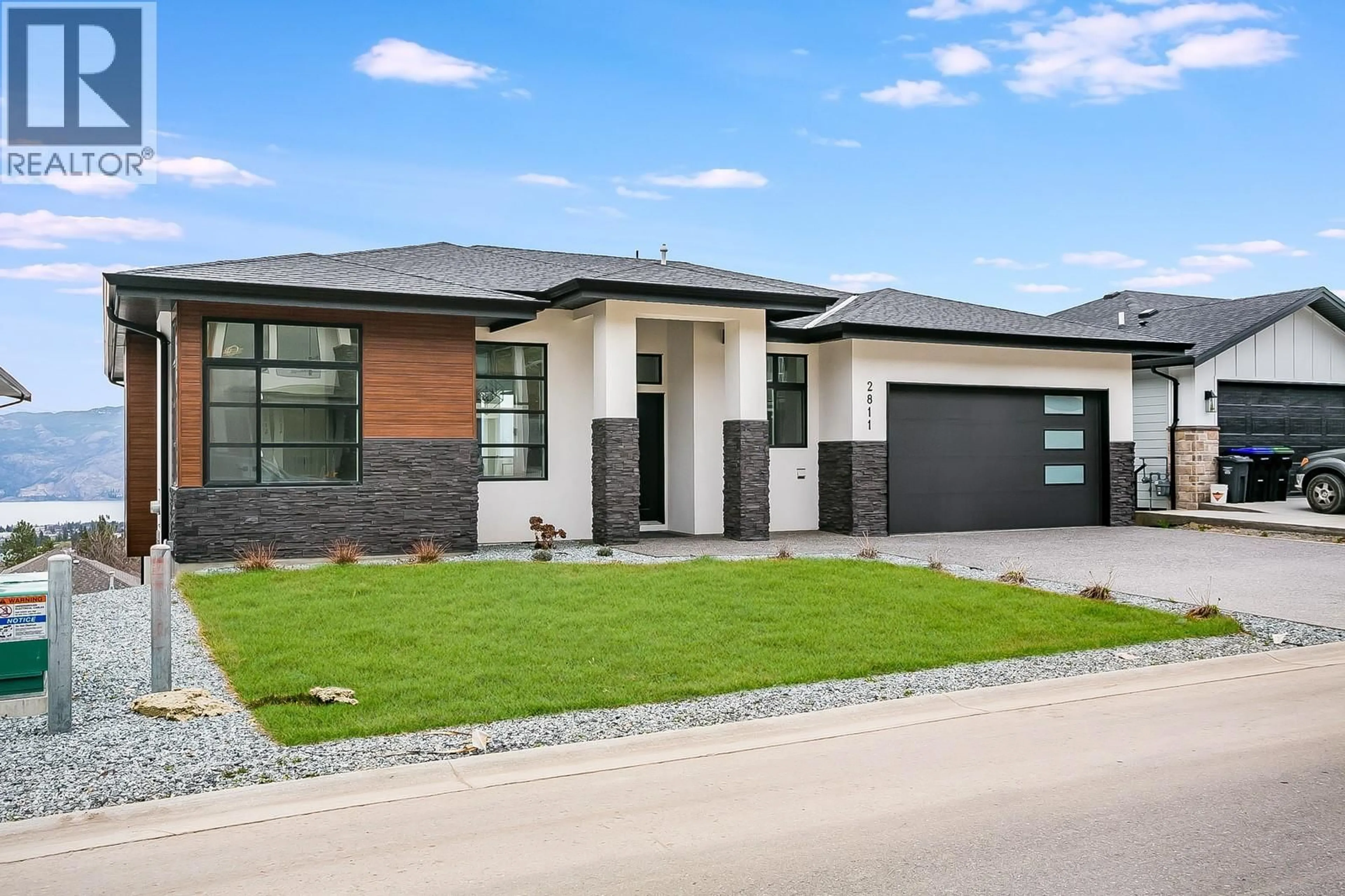 Home with brick exterior material, street for 2811 COPPER RIDGE DRIVE, West Kelowna British Columbia V4T0E7