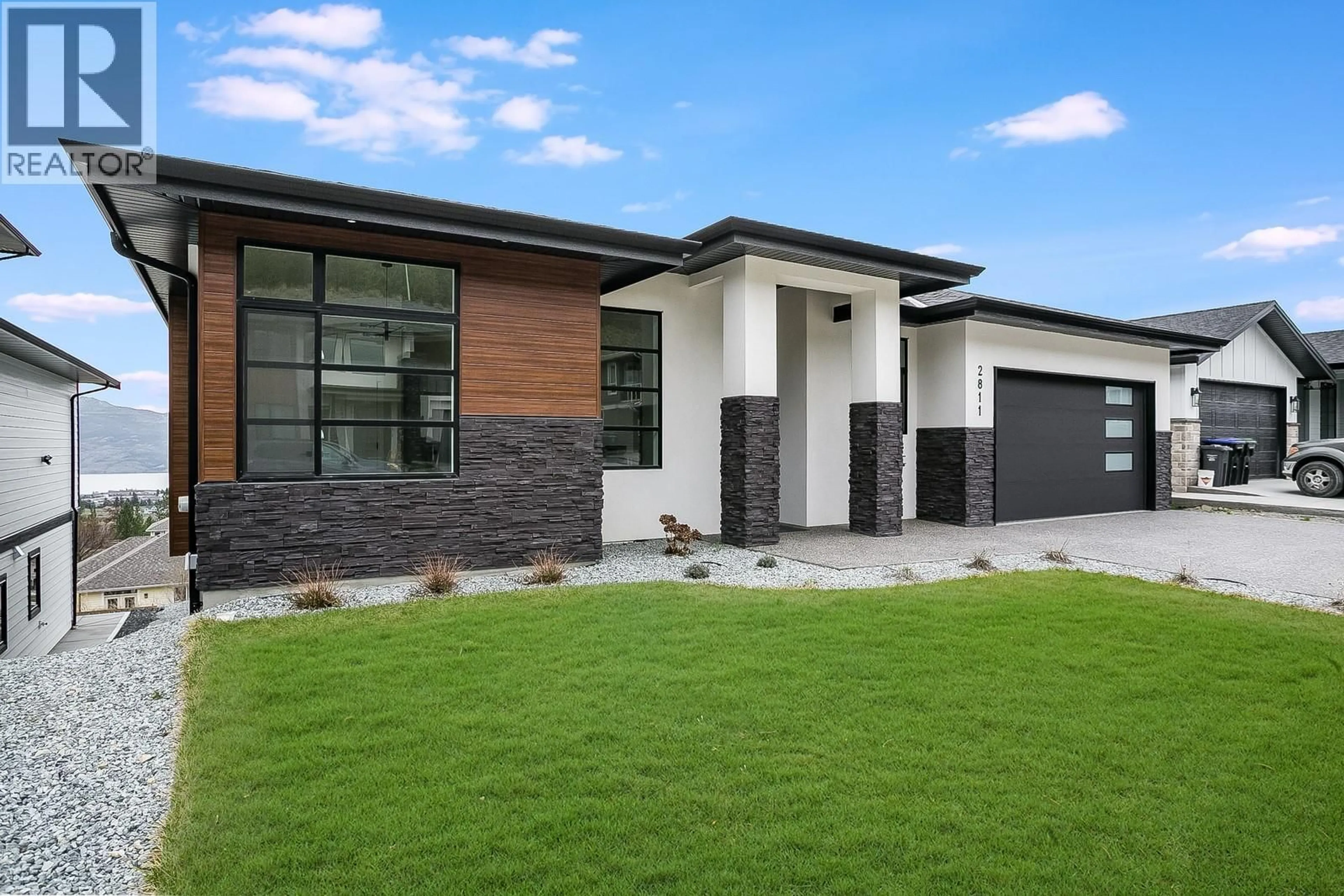 Home with brick exterior material, street for 2811 COPPER RIDGE DRIVE, West Kelowna British Columbia V4T0E7