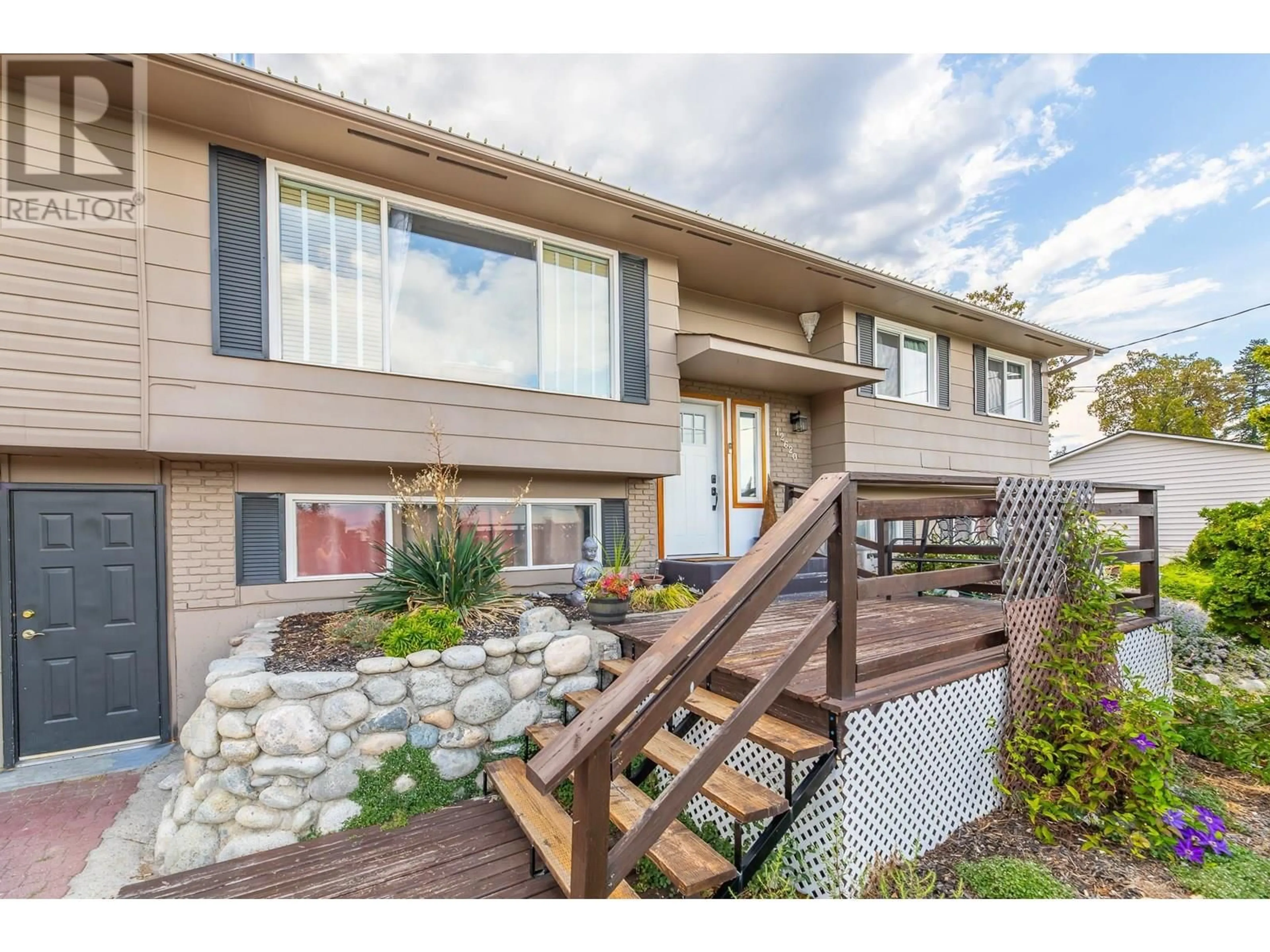 Home with vinyl exterior material, unknown for 12620 REYNOLDS AVENUE, Summerland British Columbia V0H1Z8