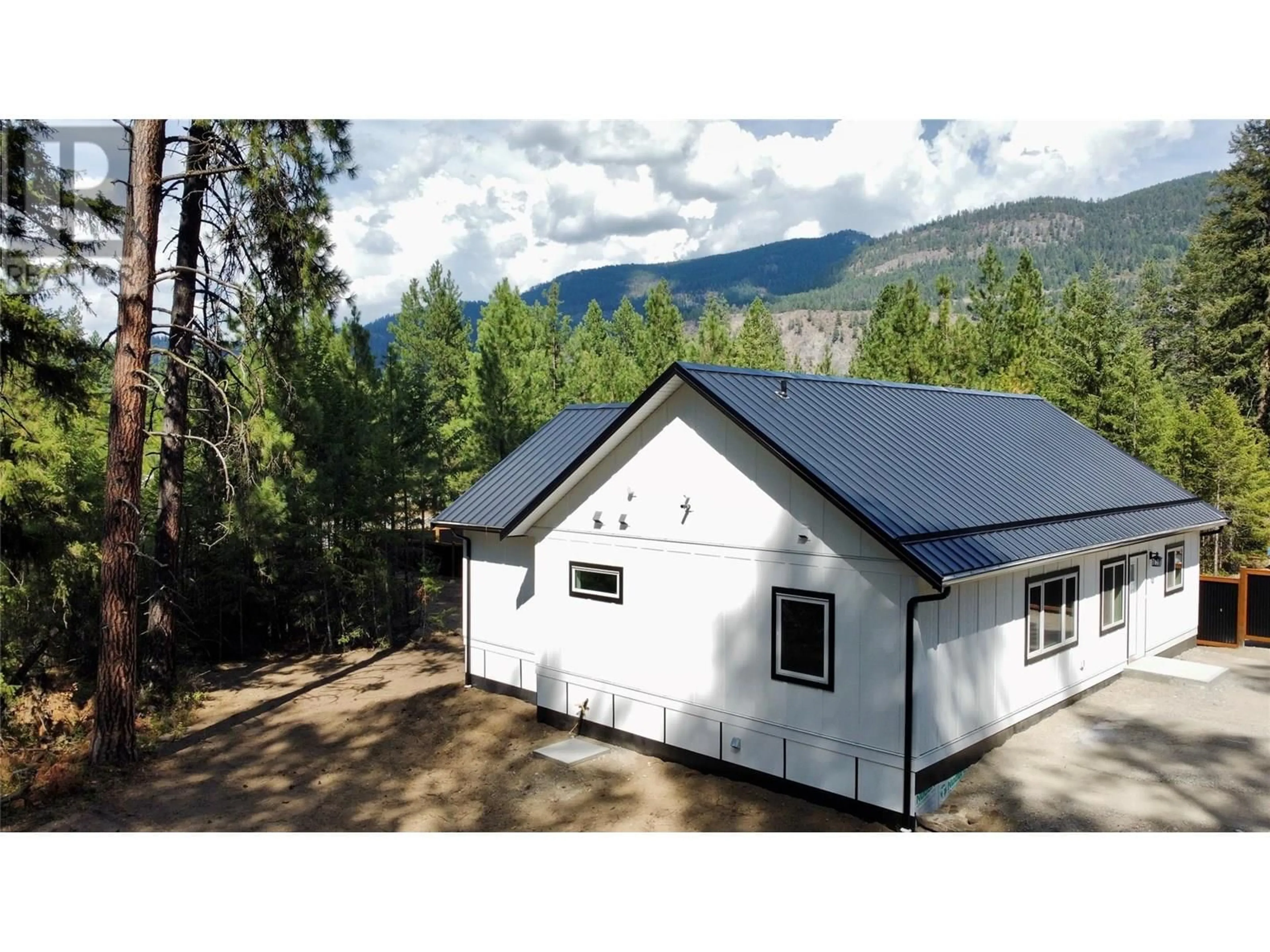 A pic from outside/outdoor area/front of a property/back of a property/a pic from drone, mountain view for 160 3RD AVENUE, Christina Lake British Columbia V0H1E0