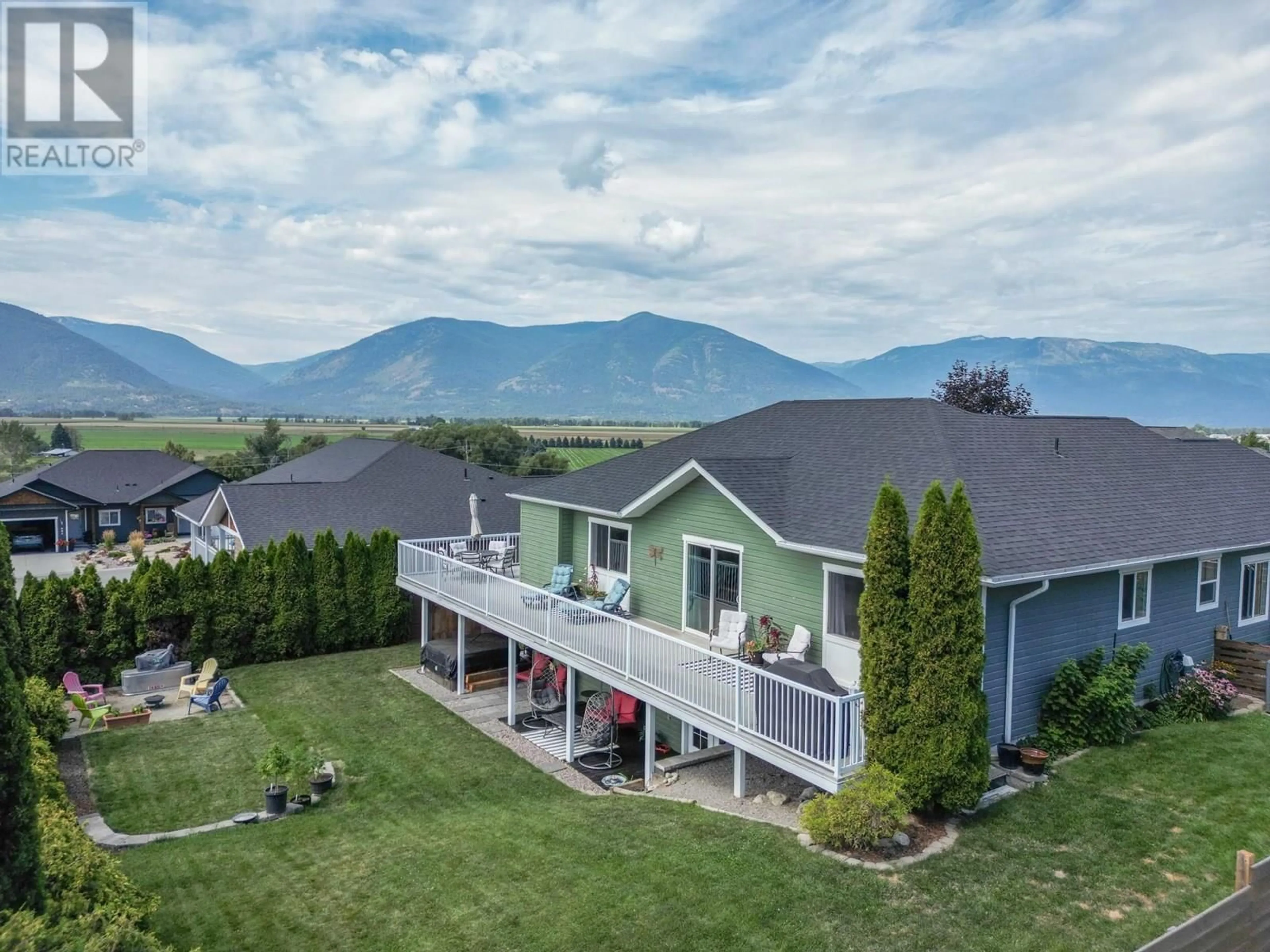 A pic from outside/outdoor area/front of a property/back of a property/a pic from drone, mountain view for 908 PURCELL CRESCENT, Creston British Columbia V0B1G3