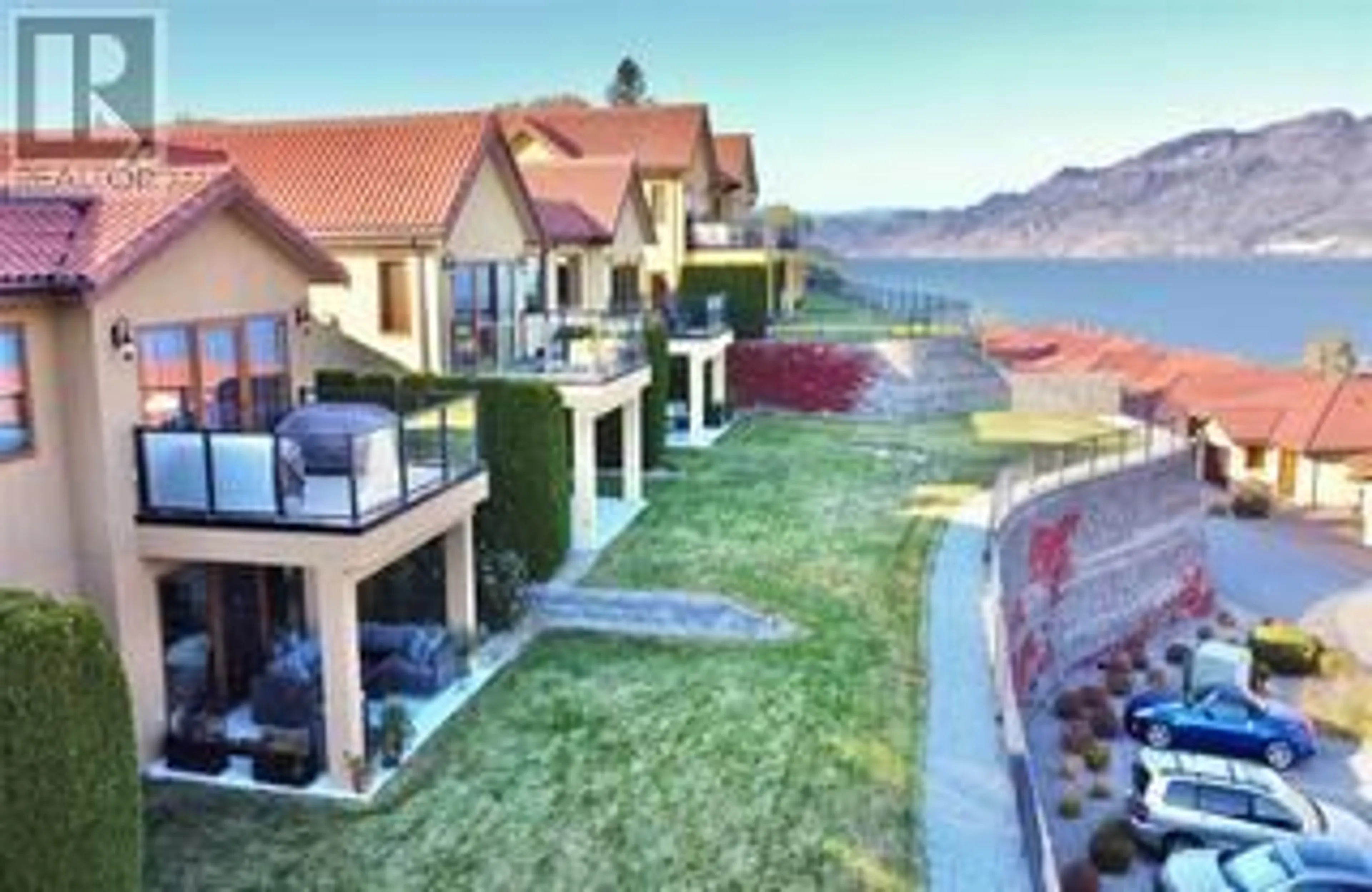 A pic from outside/outdoor area/front of a property/back of a property/a pic from drone, water/lake/river/ocean view for 201 - 14451 DOWNTON AVENUE, Summerland British Columbia V0H1Z1