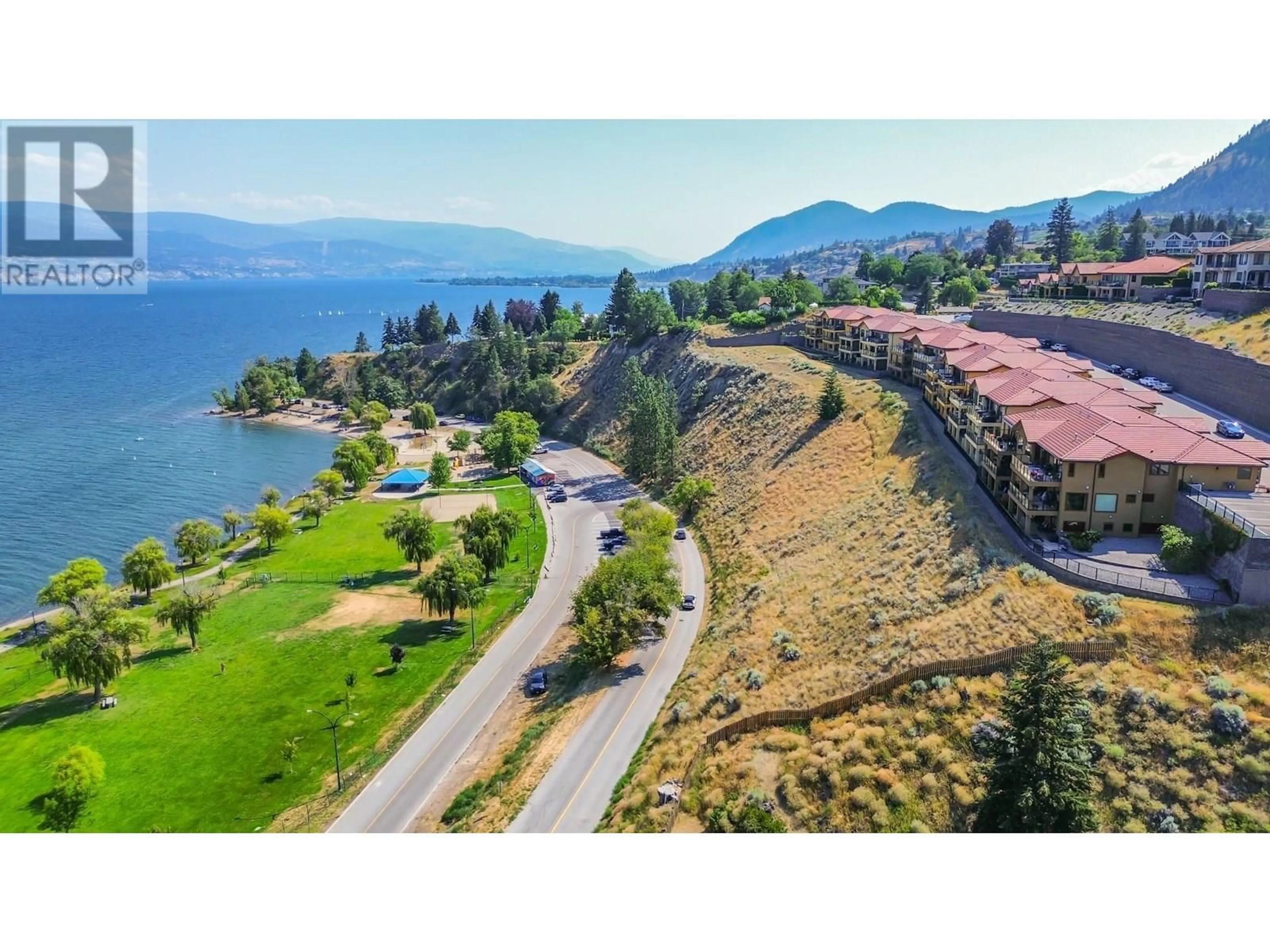 A pic from outside/outdoor area/front of a property/back of a property/a pic from drone, water/lake/river/ocean view for 201 - 14451 DOWNTON AVENUE, Summerland British Columbia V0H1Z1