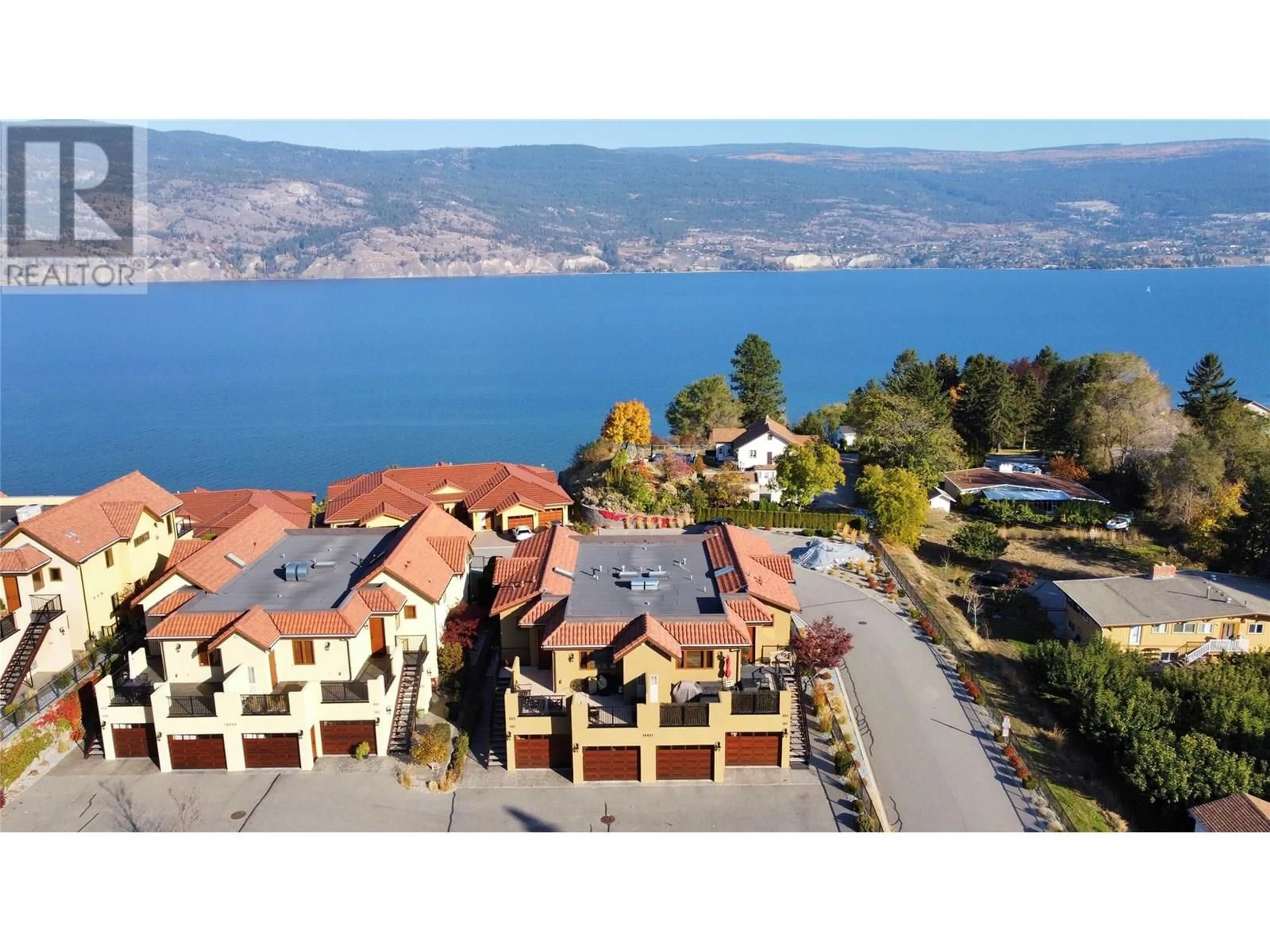 A pic from outside/outdoor area/front of a property/back of a property/a pic from drone, water/lake/river/ocean view for 201 - 14451 DOWNTON AVENUE, Summerland British Columbia V0H1Z1