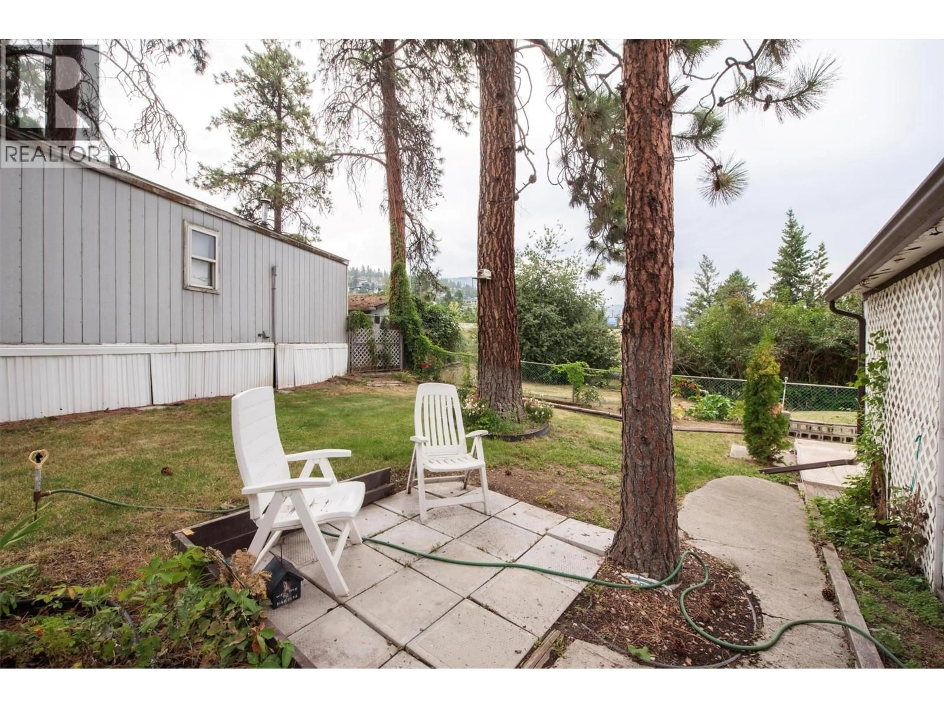 Patio, forest/trees view for 34 - 2001 97 HIGHWAY SOUTH, Westbank British Columbia V1Z1B2