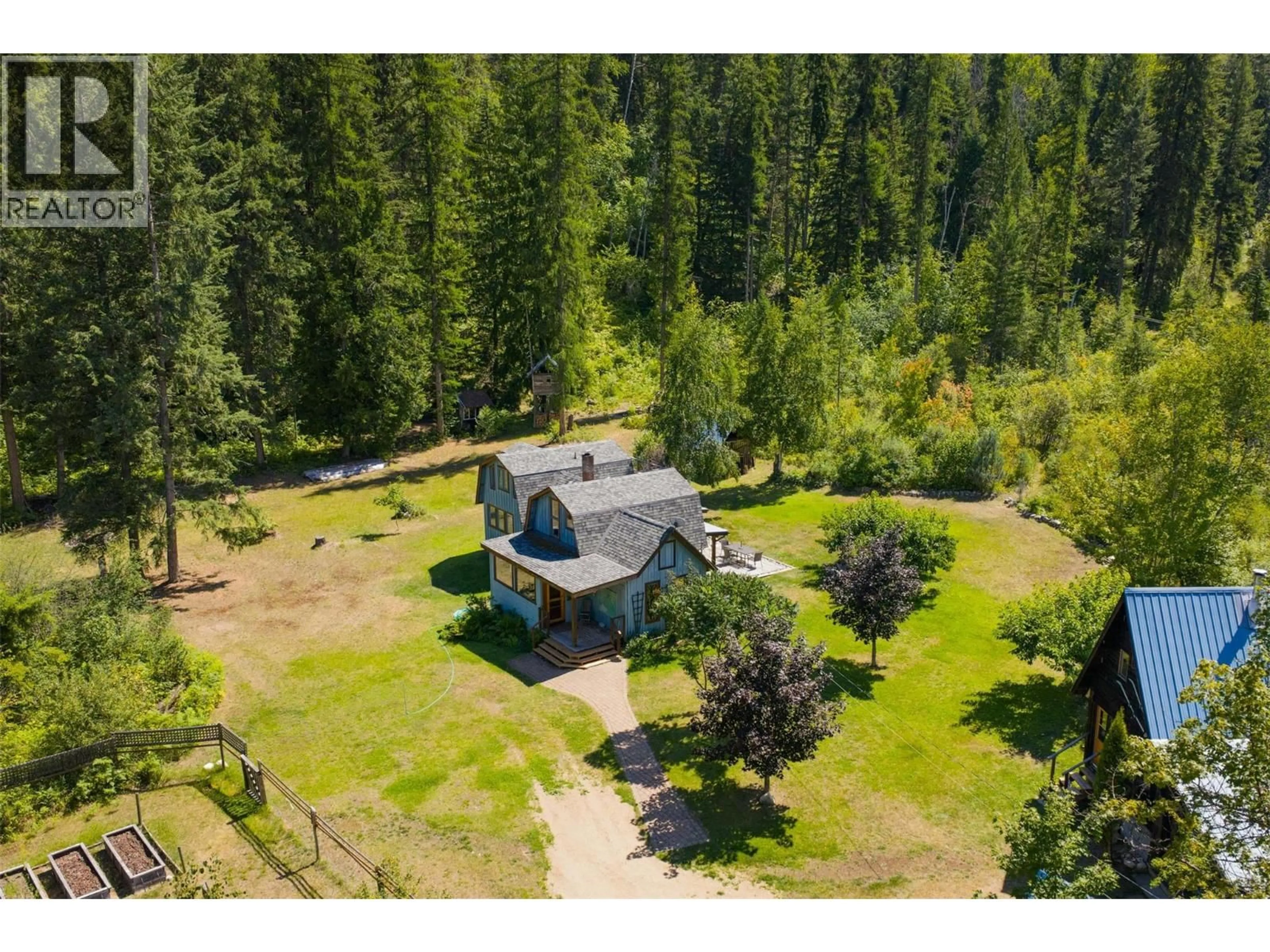 A pic from outside/outdoor area/front of a property/back of a property/a pic from drone, forest/trees view for 6042 WOODWARD ROAD, Winlaw British Columbia V0G2G0