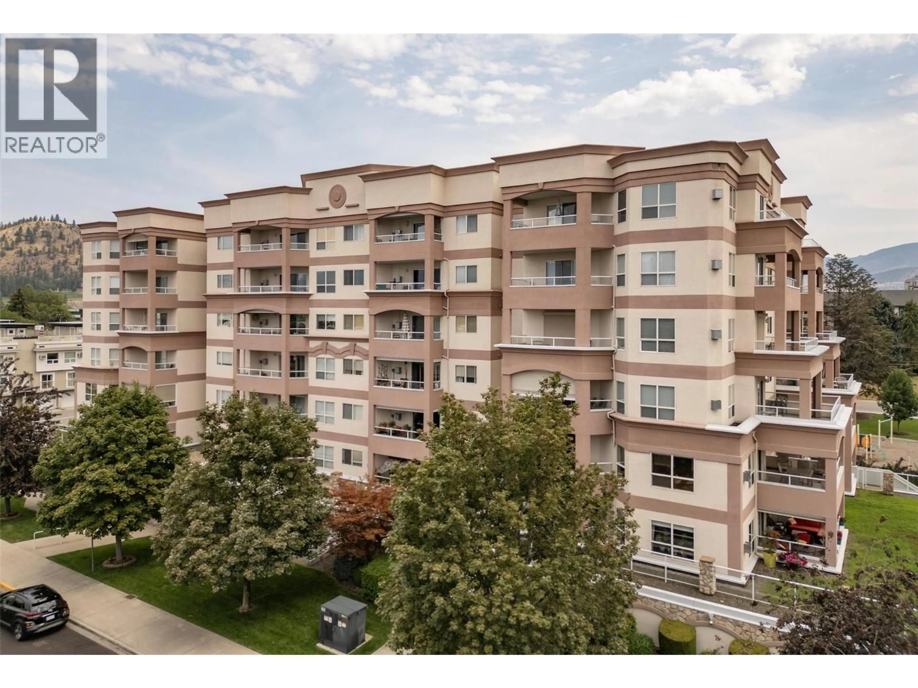 A pic from outside/outdoor area/front of a property/back of a property/a pic from drone, city buildings view from balcony for 504 - 1895 AMBROSI ROAD, Kelowna British Columbia V1Y4R8