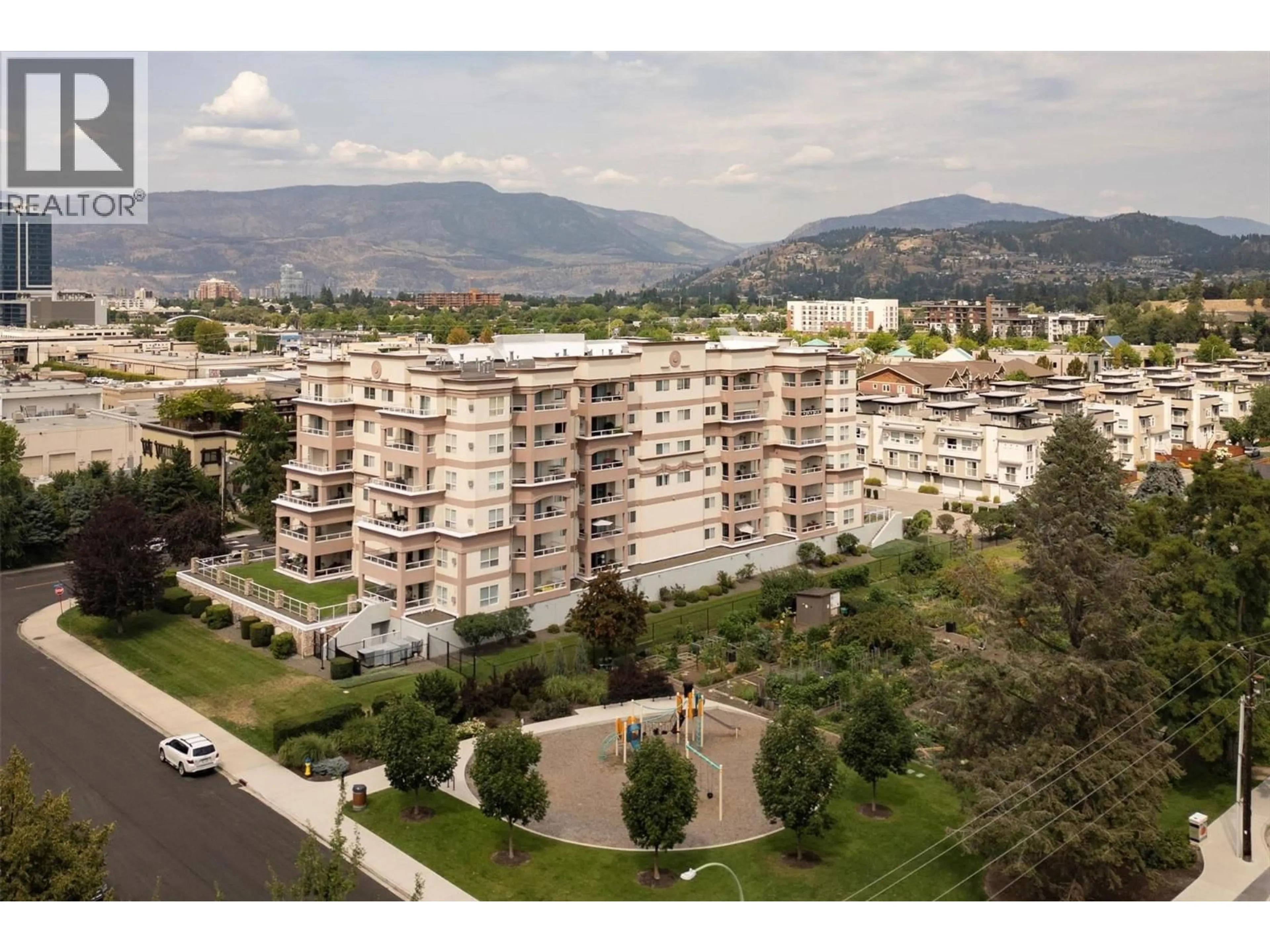 A pic from outside/outdoor area/front of a property/back of a property/a pic from drone, mountain view for 504 - 1895 AMBROSI ROAD, Kelowna British Columbia V1Y4R8