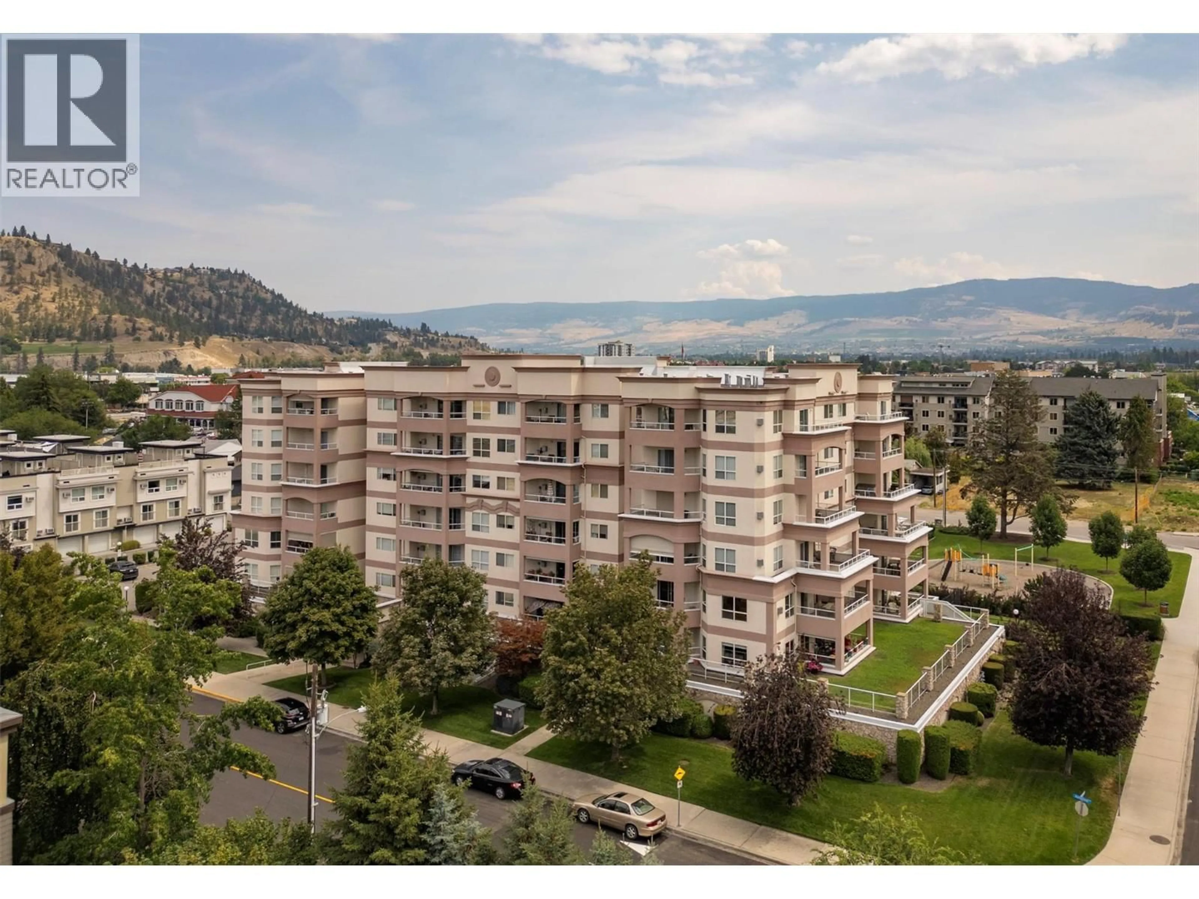 A pic from outside/outdoor area/front of a property/back of a property/a pic from drone, mountain view for 504 - 1895 AMBROSI ROAD, Kelowna British Columbia V1Y4R8