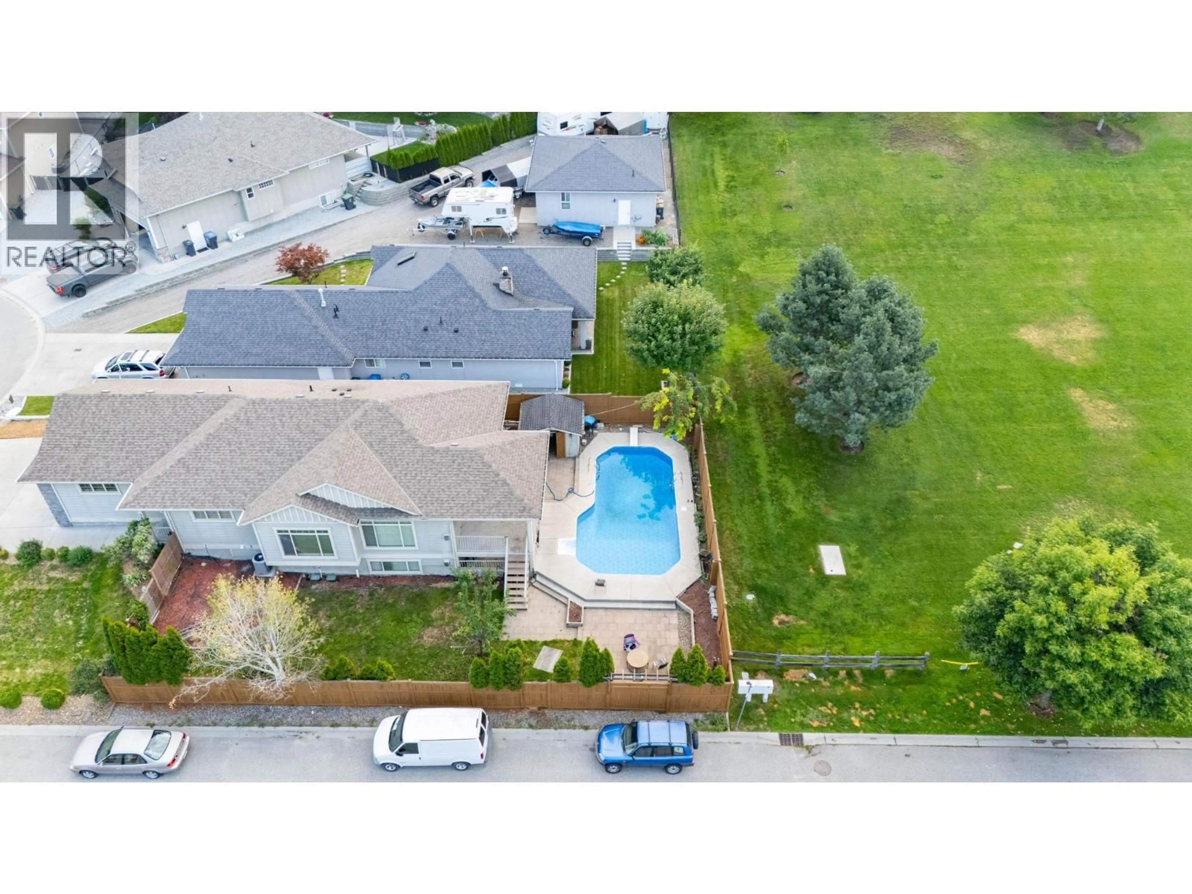 A pic from outside/outdoor area/front of a property/back of a property/a pic from drone, water/lake/river/ocean view for 447 STETSON STREET, Kelowna British Columbia V1X8A6