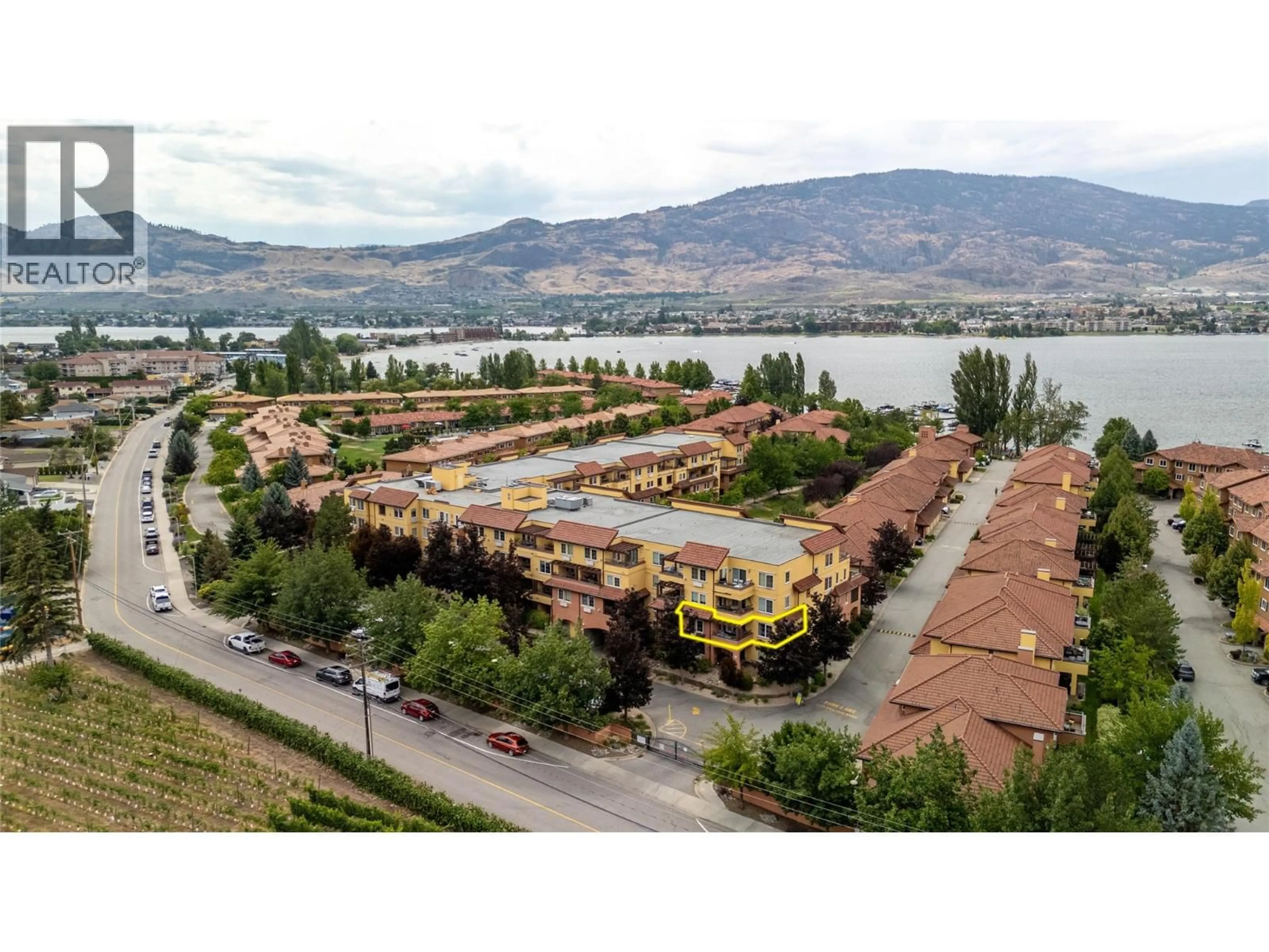 A pic from outside/outdoor area/front of a property/back of a property/a pic from drone, mountain view for 202 - 7600 COTTONWOOD DRIVE, Osoyoos British Columbia V0H1V3