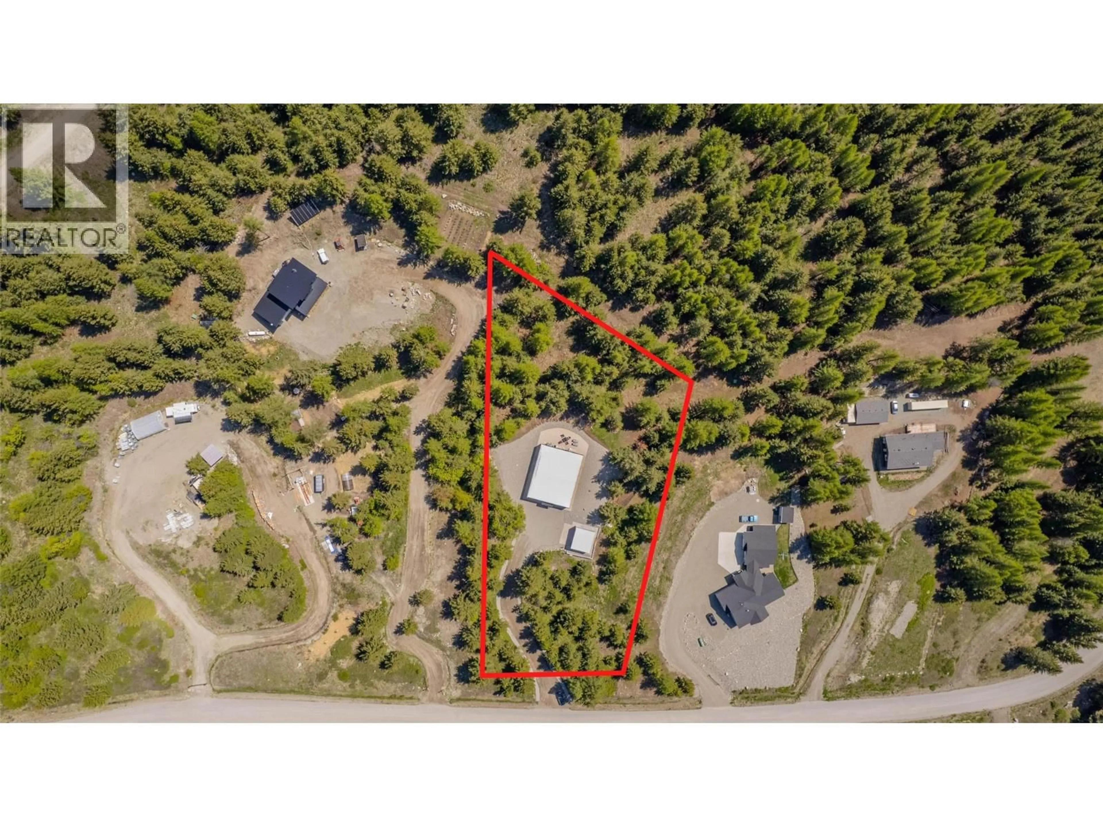 A pic from outside/outdoor area/front of a property/back of a property/a pic from drone, forest/trees view for 1324 TIMBERWOLF TRAIL ROAD, Bridesville British Columbia V0H1Y0
