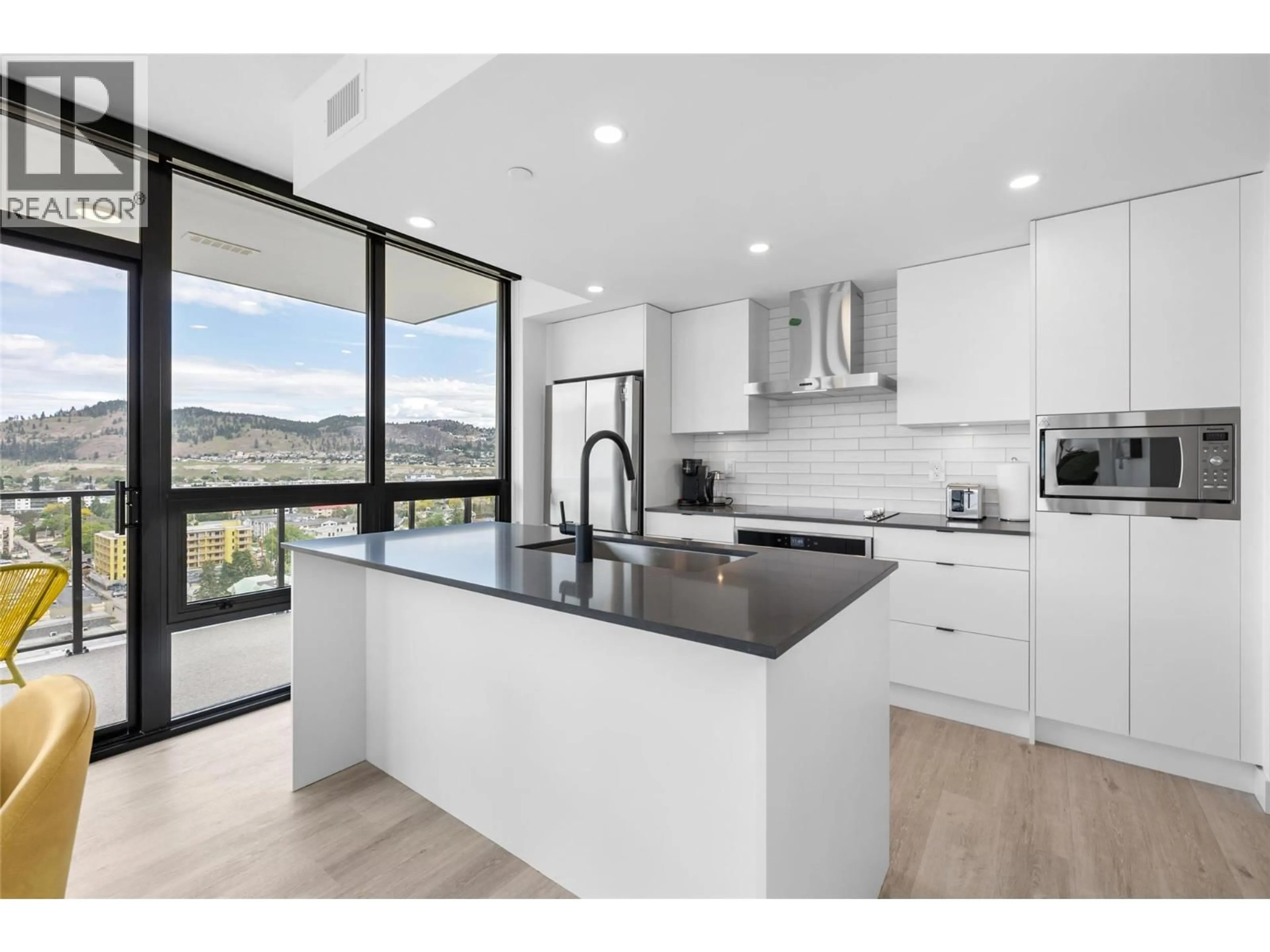 Open concept kitchen, ceramic/tile floor for 1608 - 1471 ST PAUL STREET, Kelowna British Columbia V1Y2E4