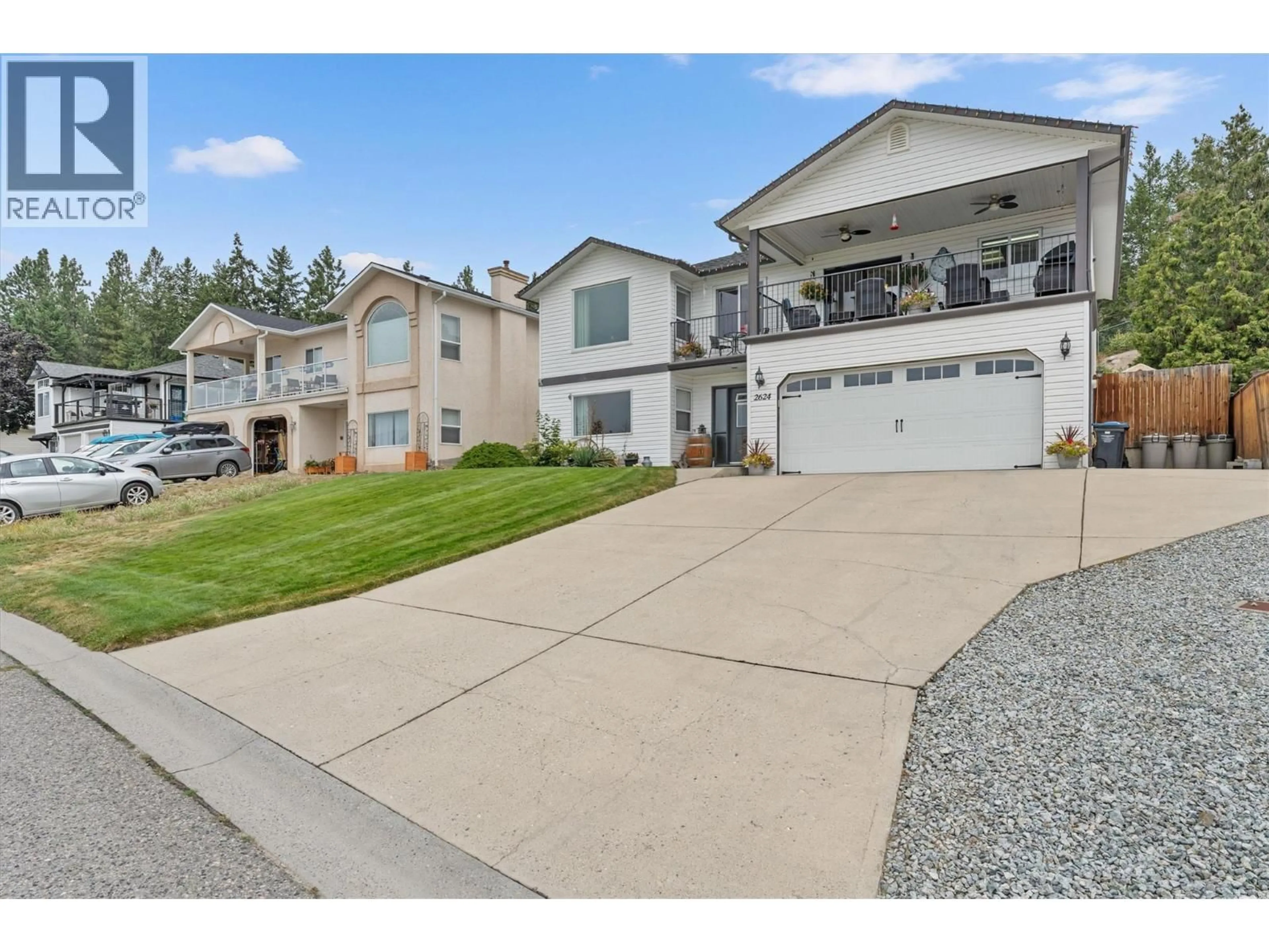 Home with vinyl exterior material, street for 2624 COPPER RIDGE DRIVE, West Kelowna British Columbia V4T2M8