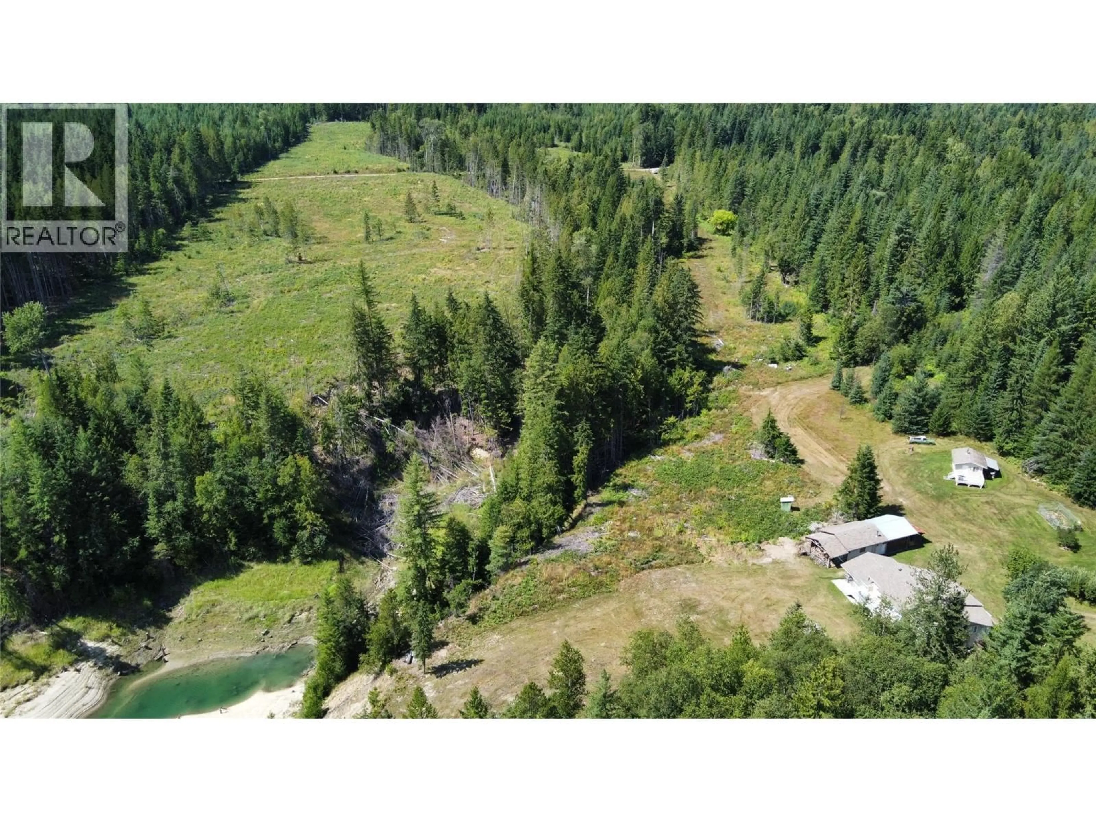 A pic from outside/outdoor area/front of a property/back of a property/a pic from drone, forest/trees view for 145 MOSTYN ROAD, Arrow Park British Columbia V0G1R1