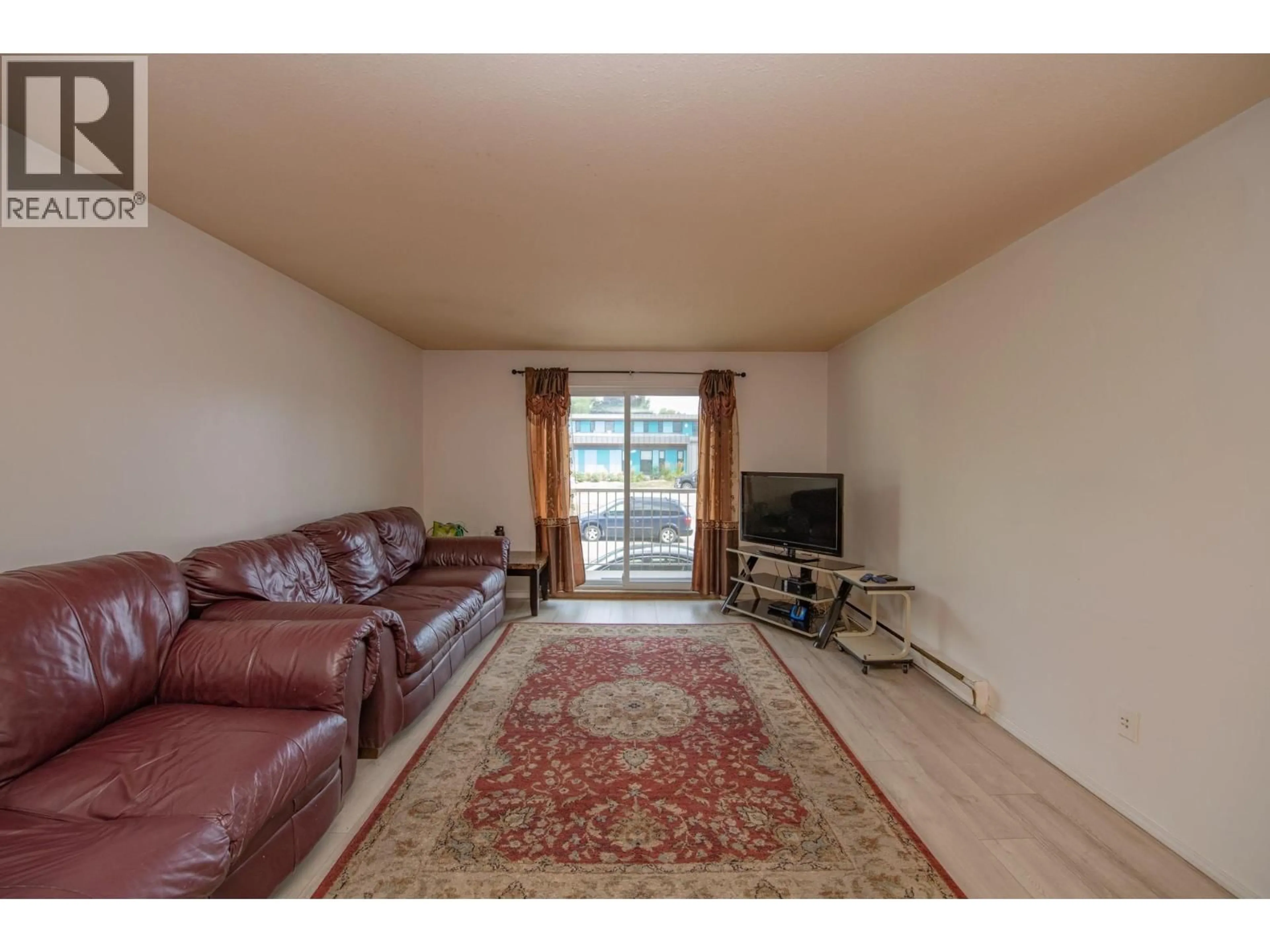 Living room with furniture, unknown for 214 - 3304 35 AVENUE, Vernon British Columbia V1T8M6