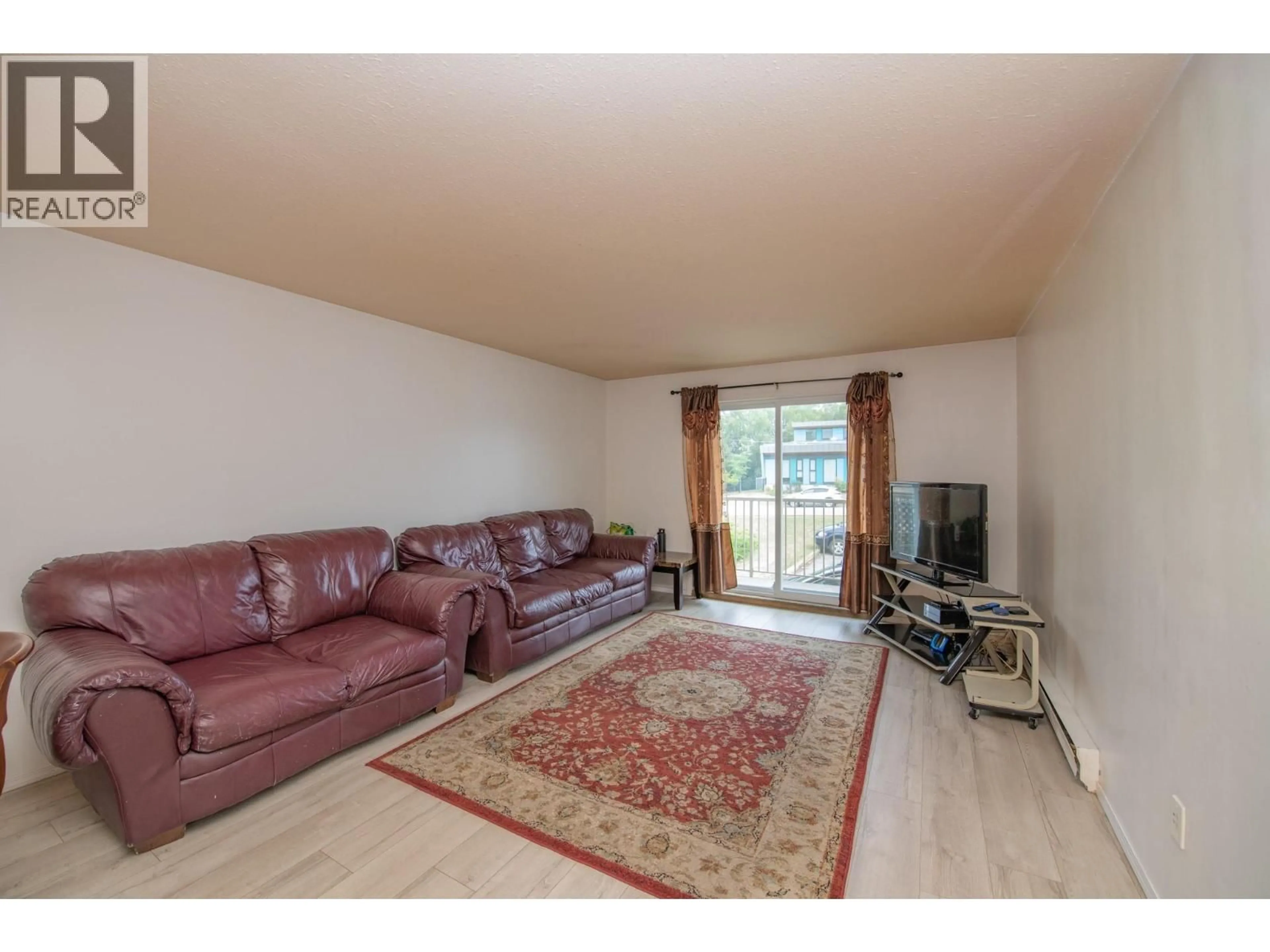 Living room with furniture, unknown for 214 - 3304 35 AVENUE, Vernon British Columbia V1T8M6