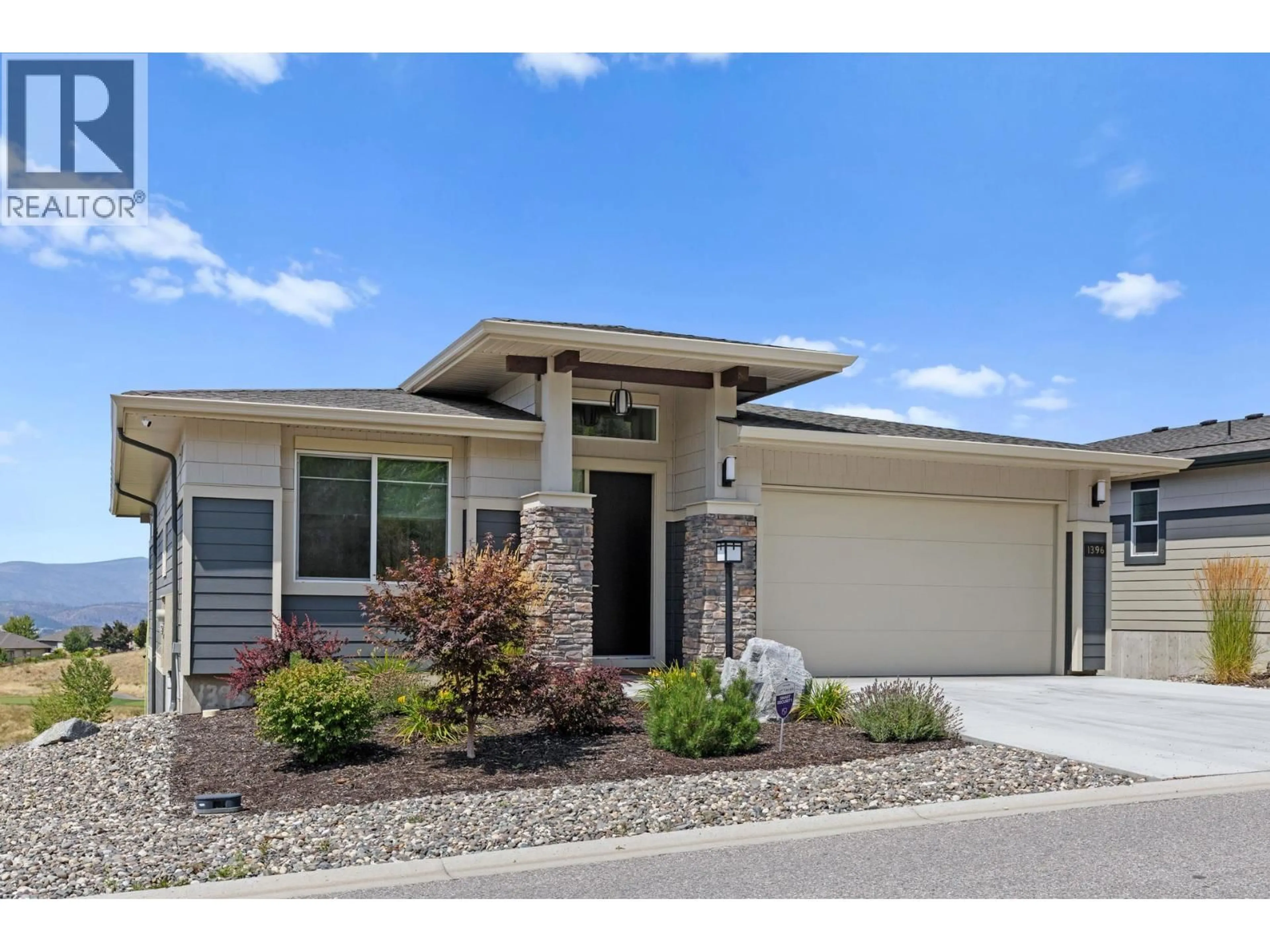 Home with vinyl exterior material, street for 1396 TOWER RANCH DRIVE, Kelowna British Columbia V1P1T8