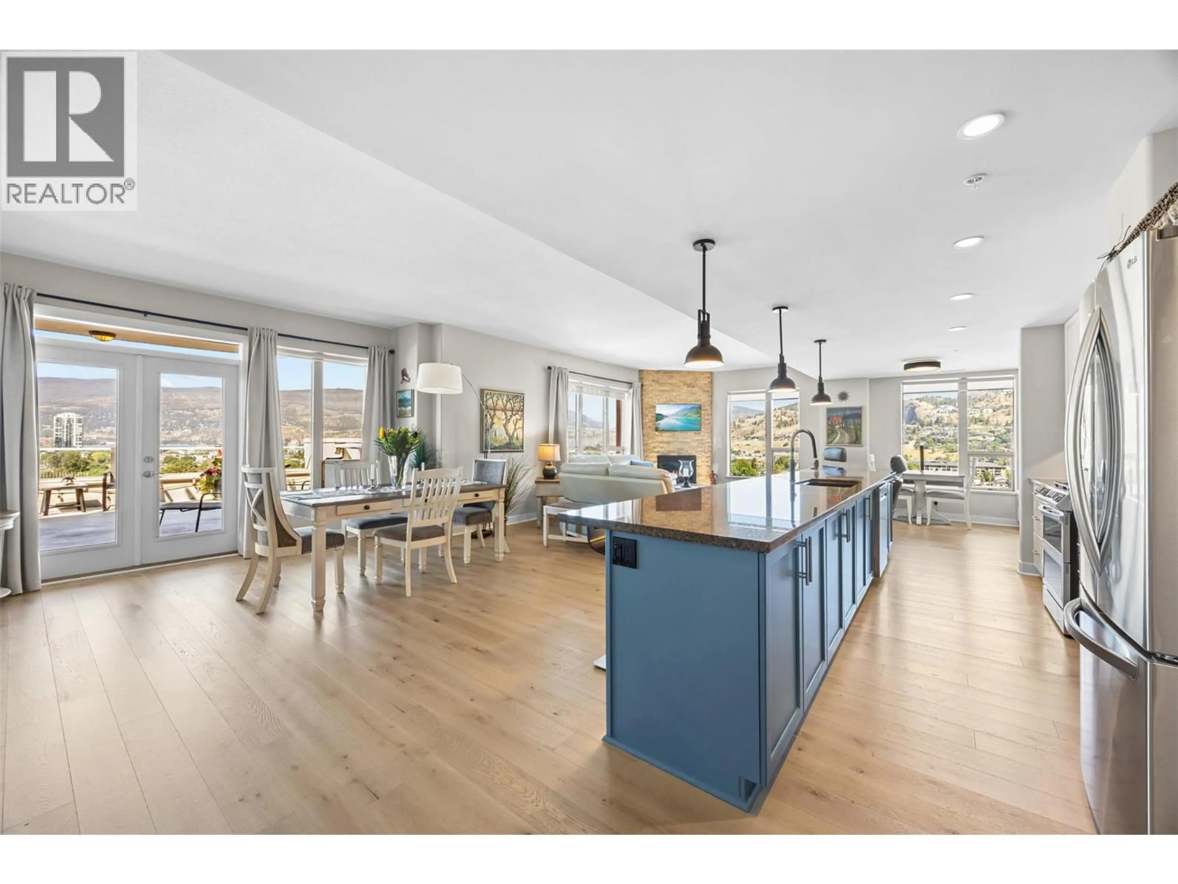 Open concept kitchen, wood/laminate floor for 1109 - 1160 BERNARD AVENUE, Kelowna British Columbia V1Y6R2