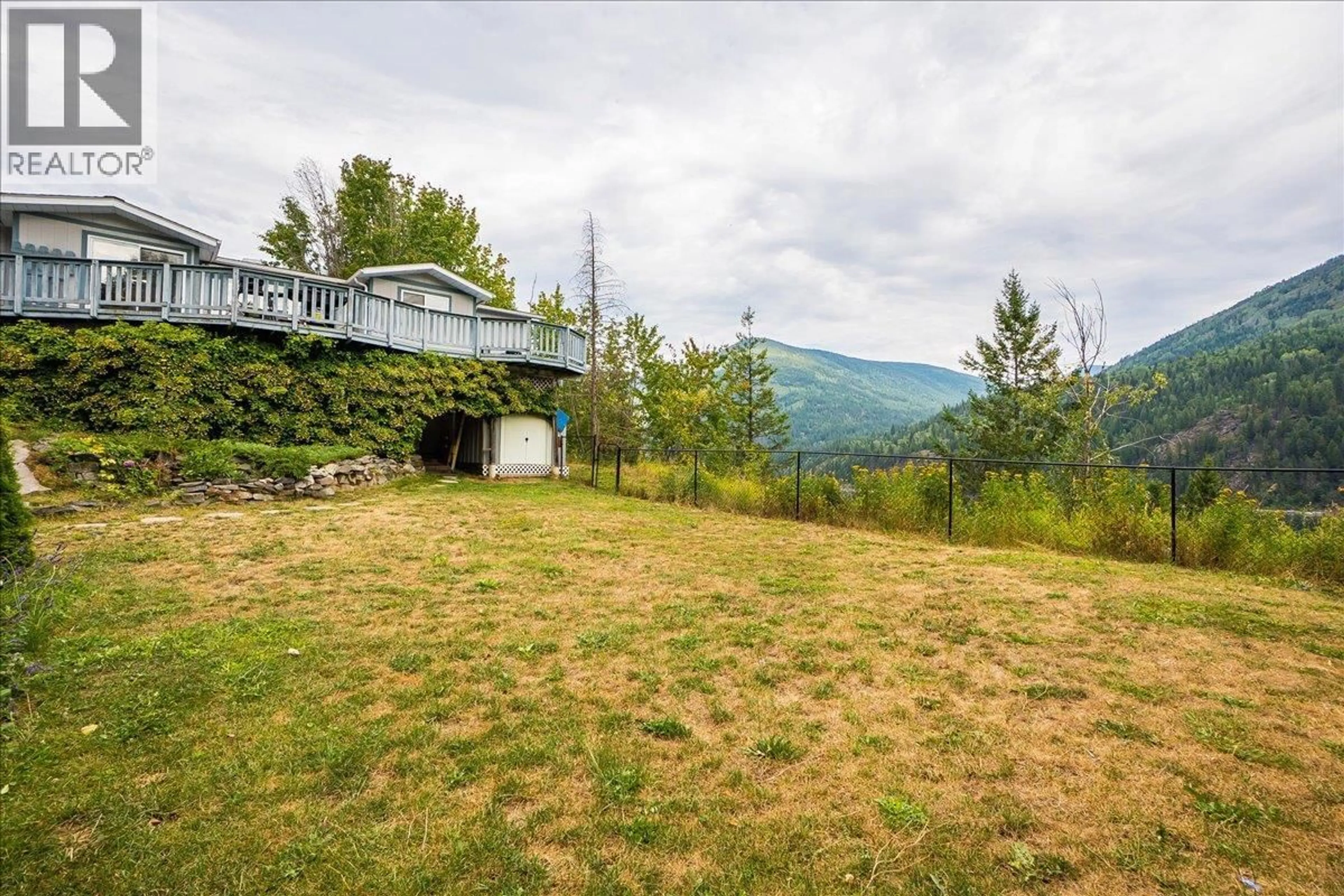 A pic from outside/outdoor area/front of a property/back of a property/a pic from drone, mountain view for 1402 GRANITE ROAD, Nelson British Columbia V1L5T6