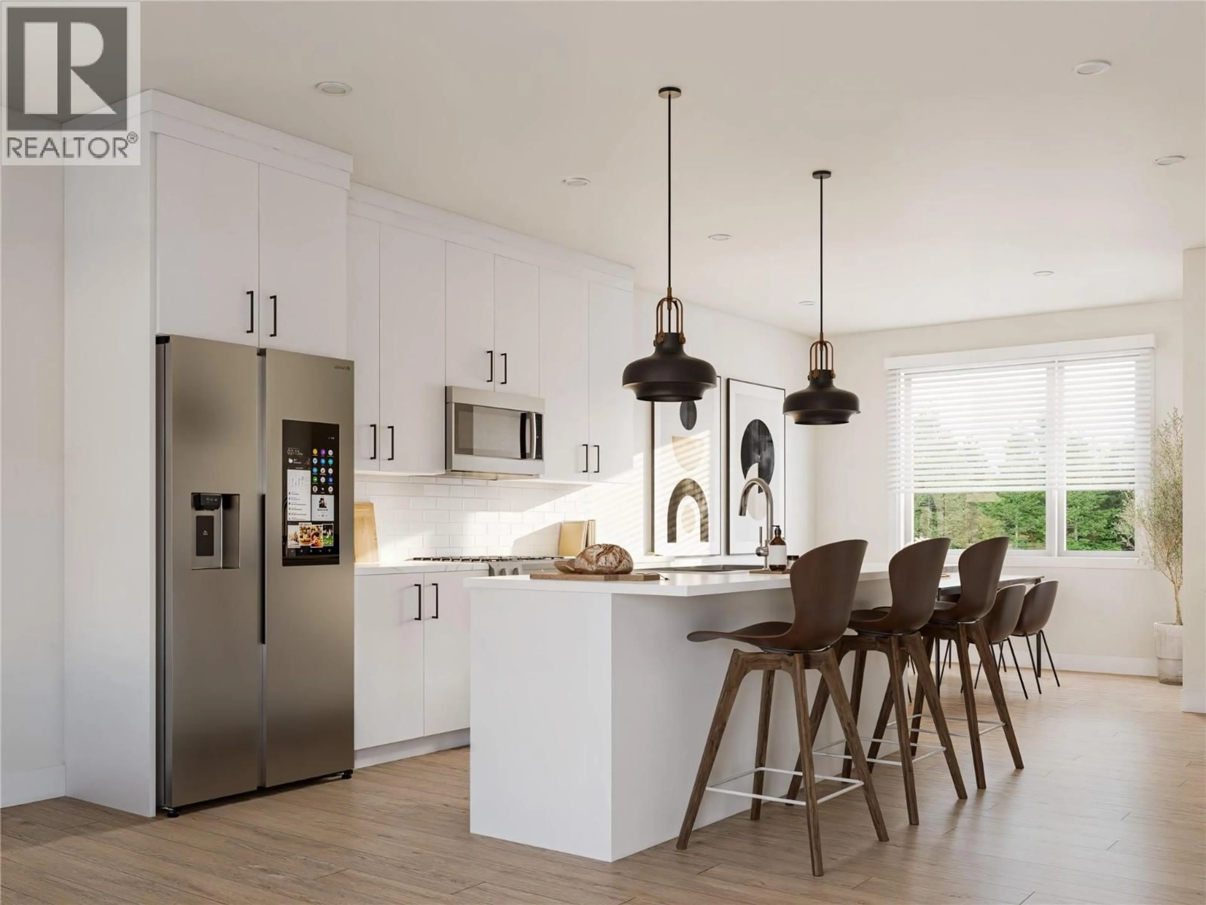 Open concept kitchen, wood/laminate floor for 2 - 222 TEMPLE STREET, Sicamous British Columbia V0E2V0