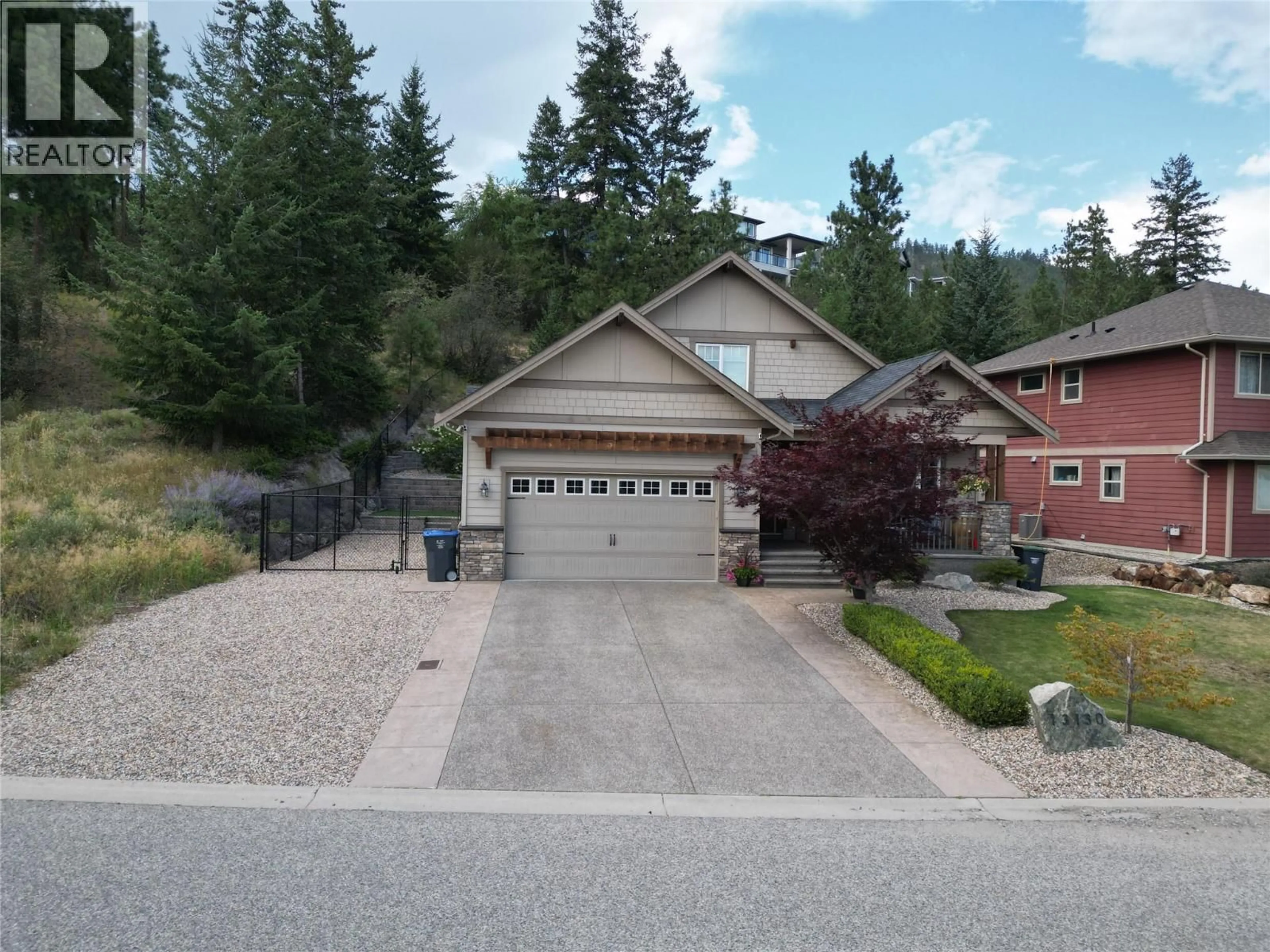 A pic from outside/outdoor area/front of a property/back of a property/a pic from drone, street for 13130 SHORELINE DRIVE, Lake Country British Columbia V4V2T2