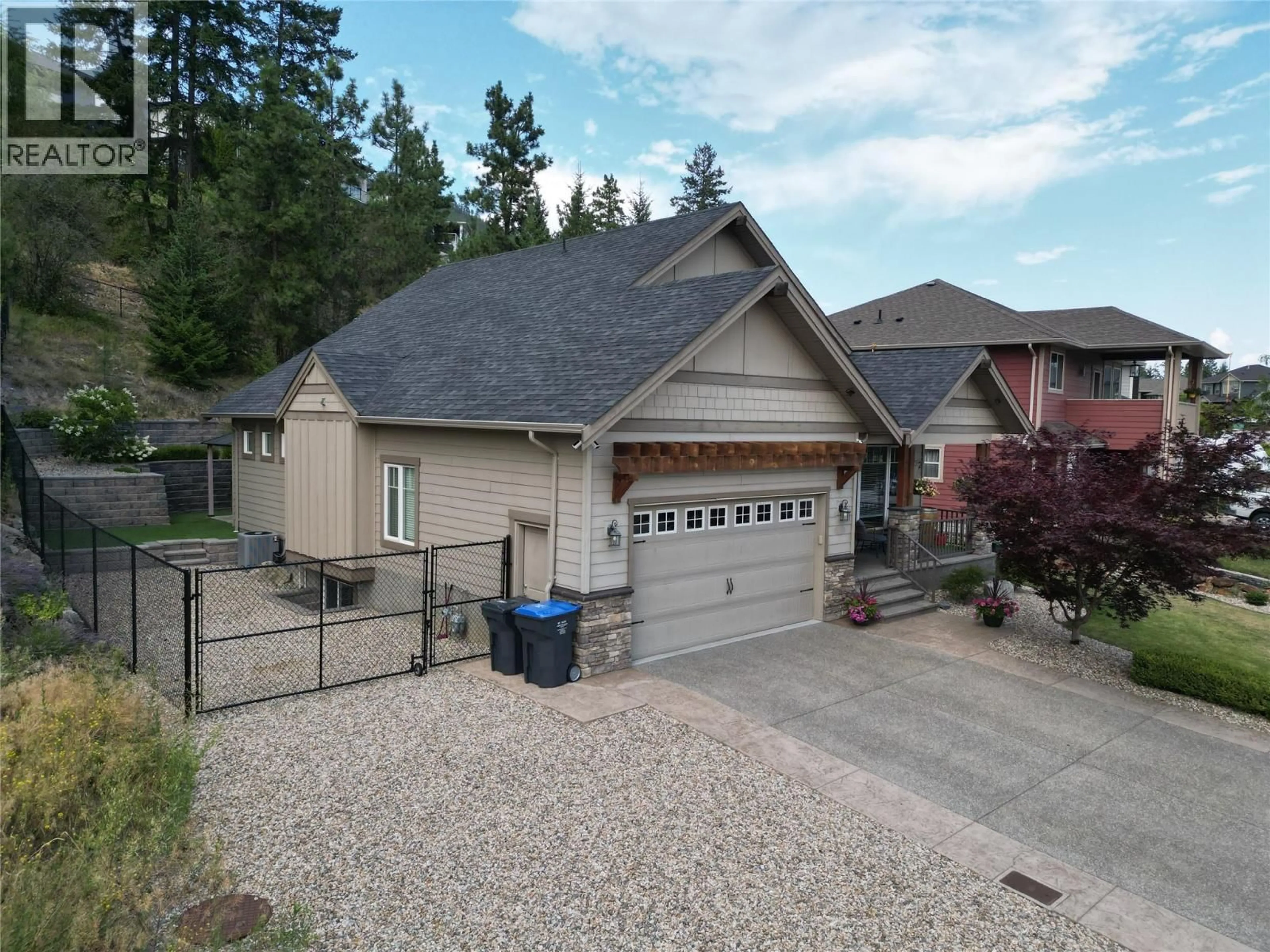 A pic from outside/outdoor area/front of a property/back of a property/a pic from drone, street for 13130 SHORELINE DRIVE, Lake Country British Columbia V4V2T2