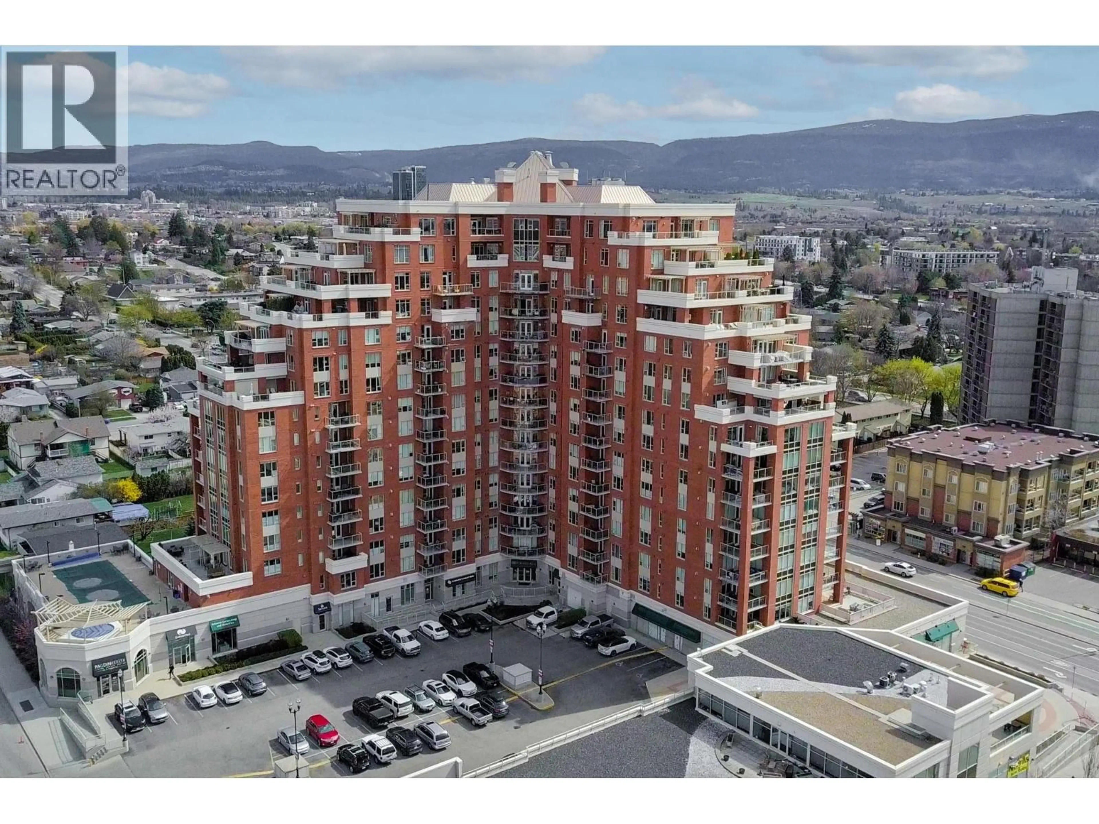 A pic from outside/outdoor area/front of a property/back of a property/a pic from drone, building for 205 - 1160 BERNARD AVENUE, Kelowna British Columbia V1Y6R2