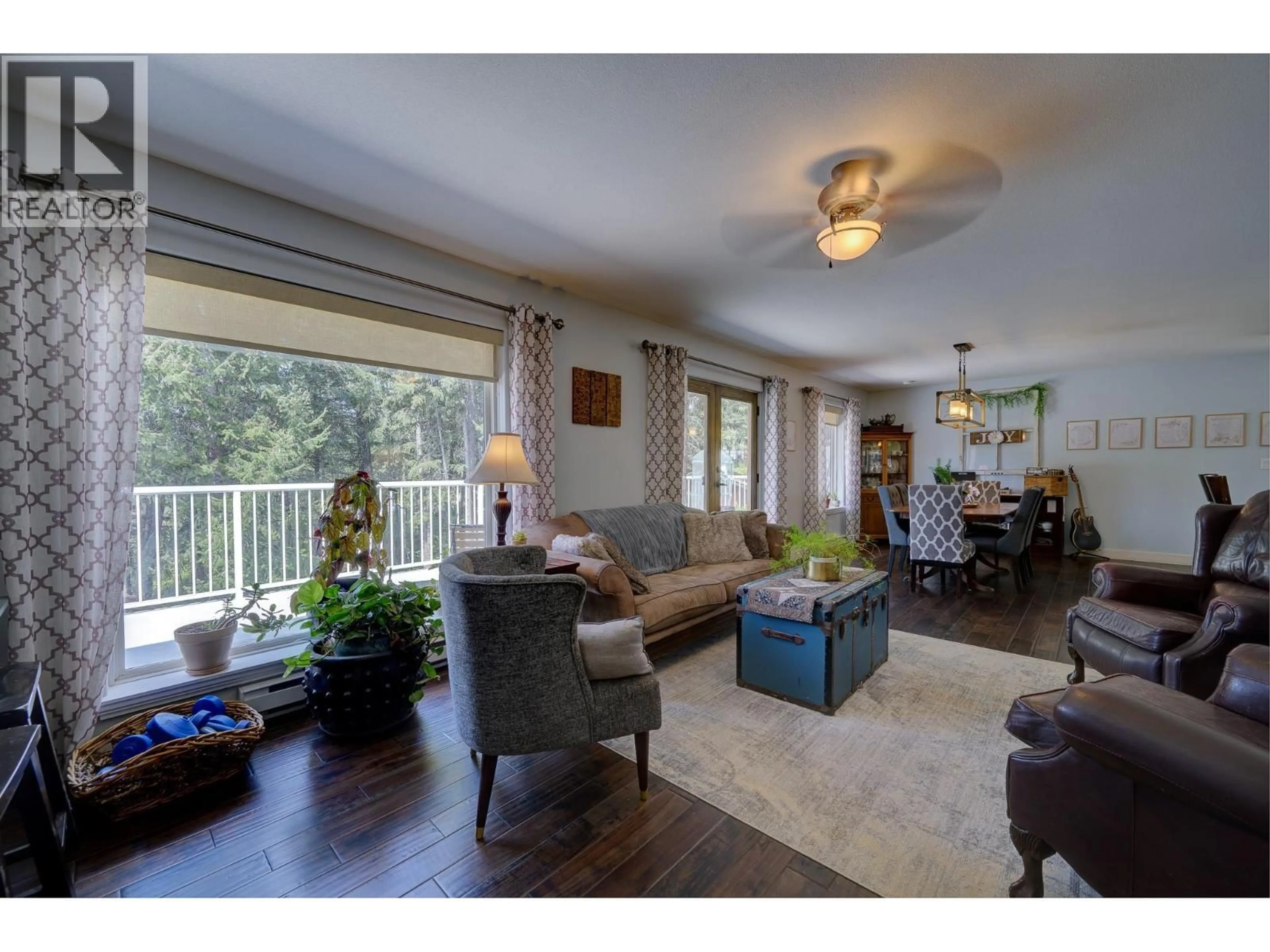 Living room with furniture, wood/laminate floor for 2959 PIVA ROAD, Kamloops British Columbia V0E3E0